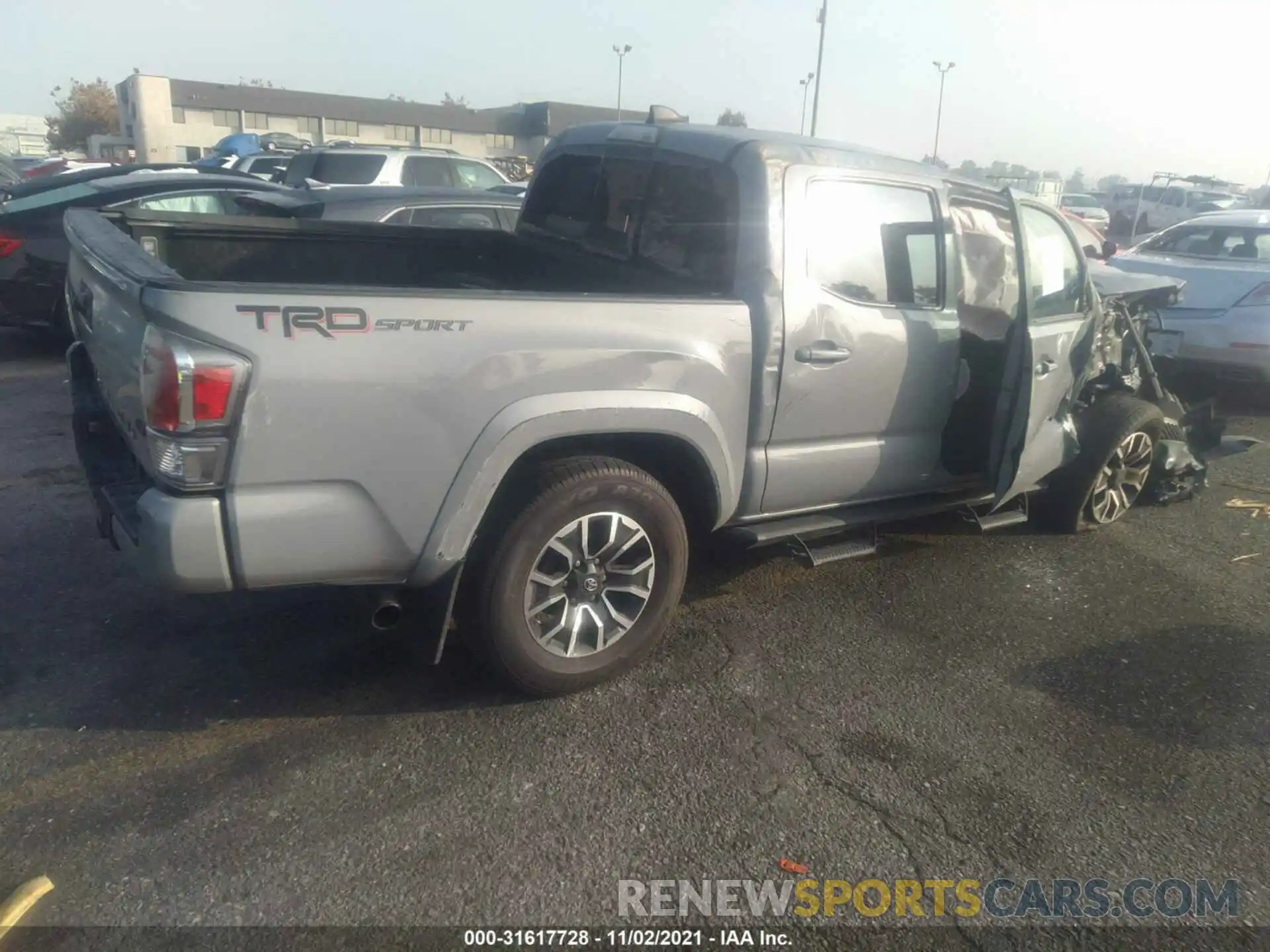 4 Photograph of a damaged car 3TMAZ5CN0LM131686 TOYOTA TACOMA 2WD 2020