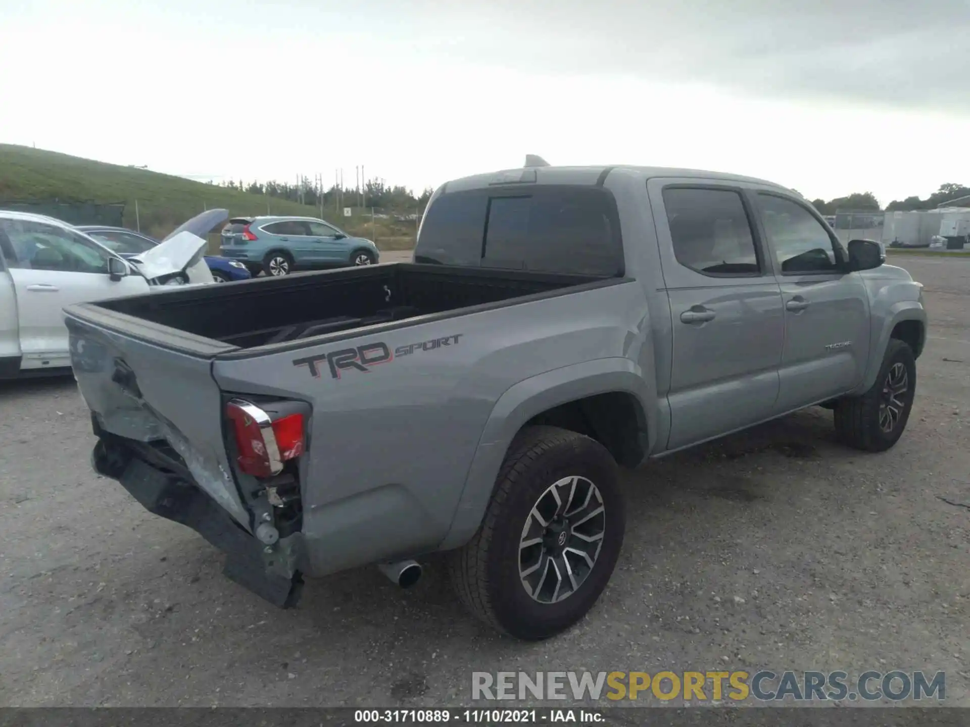 4 Photograph of a damaged car 3TMAZ5CN1LM123595 TOYOTA TACOMA 2WD 2020