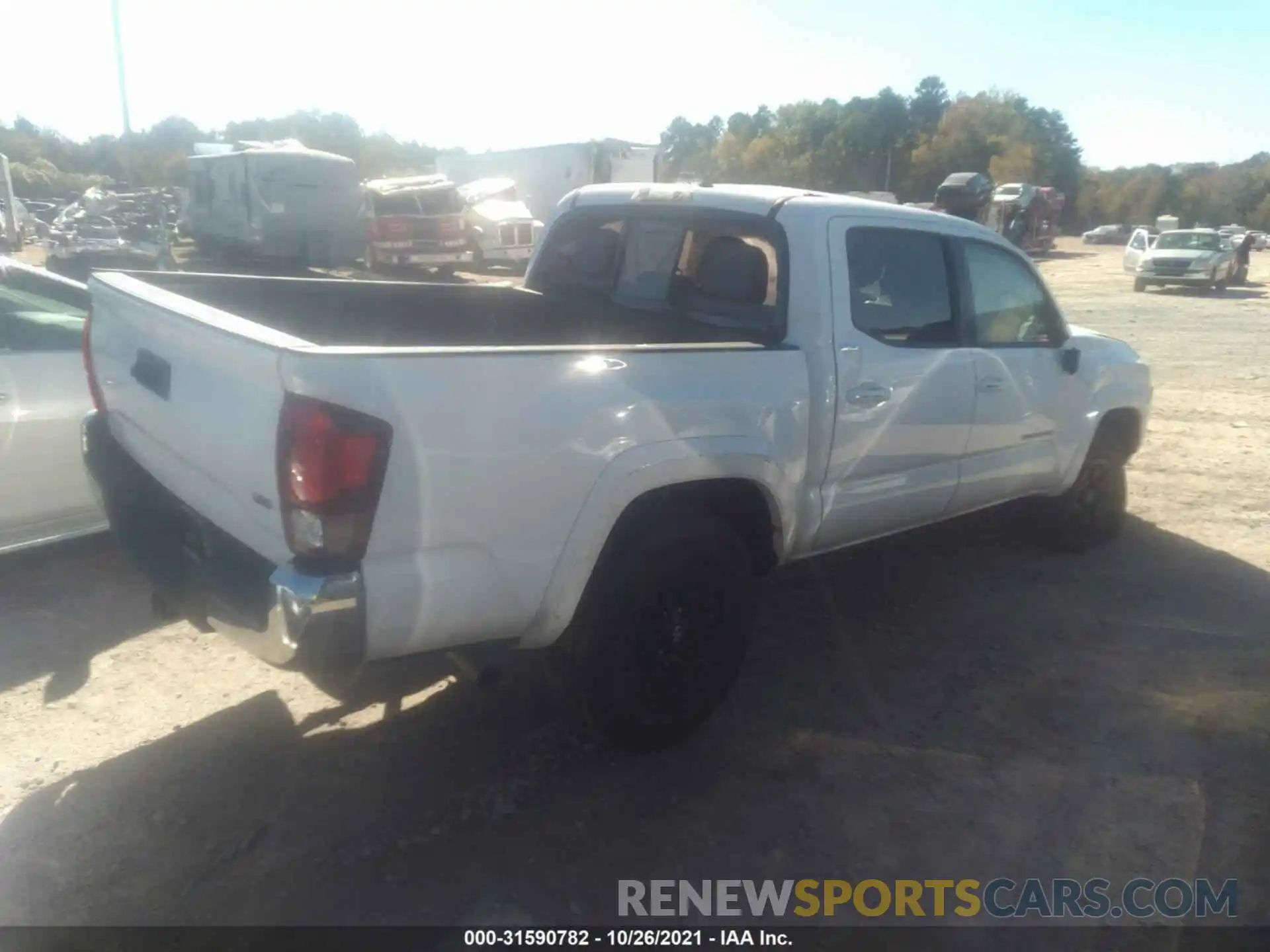 4 Photograph of a damaged car 3TMAZ5CN1LM126559 TOYOTA TACOMA 2WD 2020