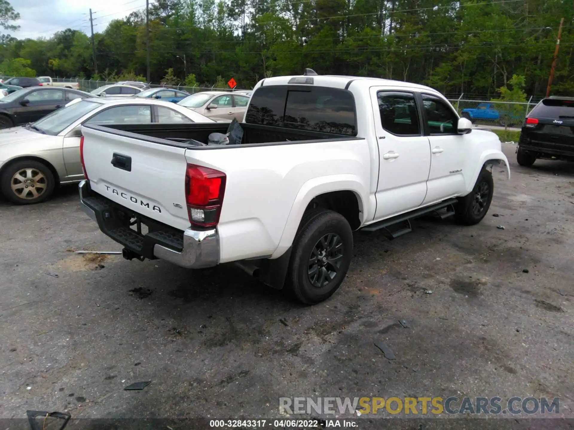 4 Photograph of a damaged car 3TMAZ5CN1LM135617 TOYOTA TACOMA 2WD 2020