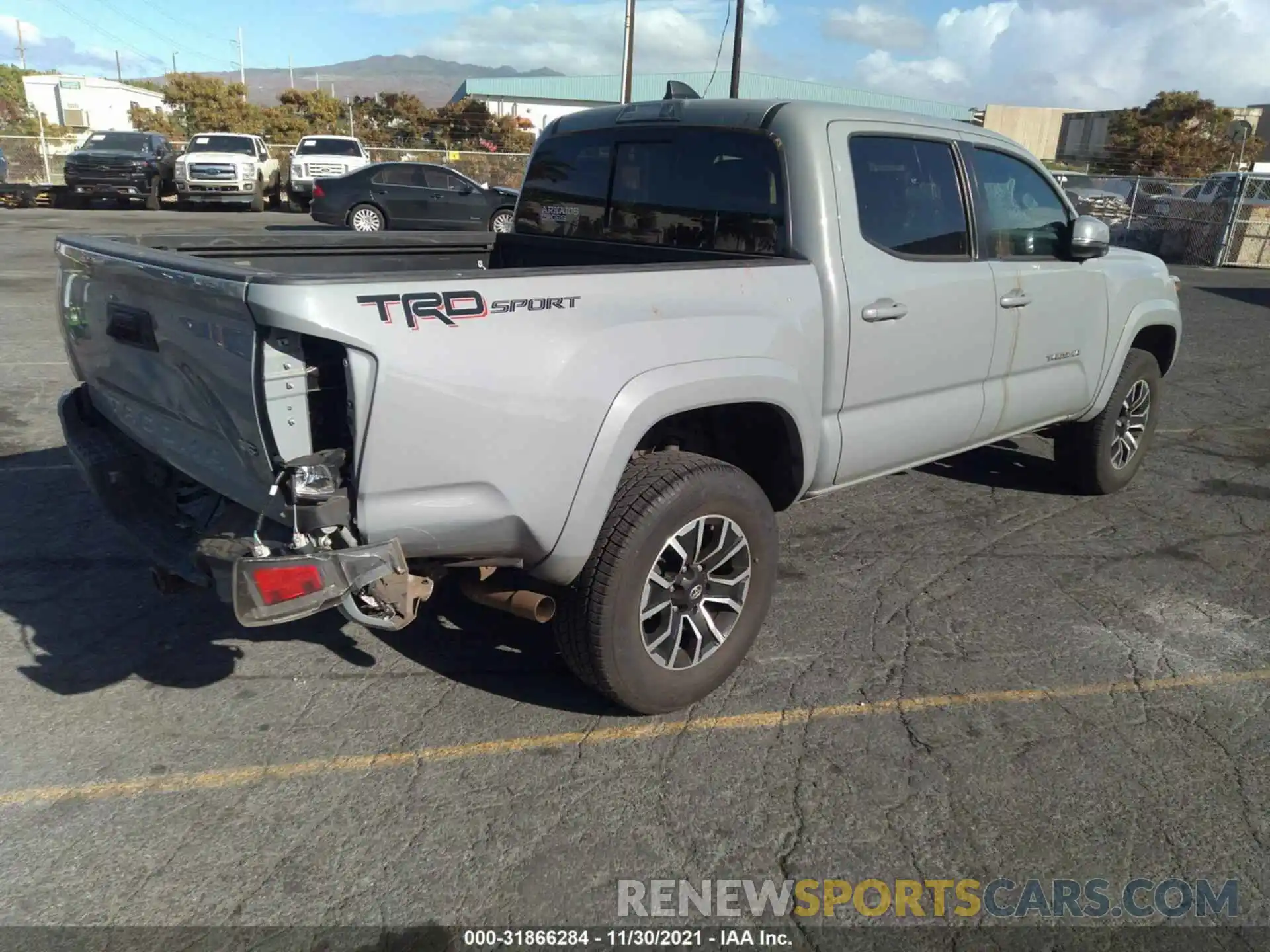 4 Photograph of a damaged car 3TMAZ5CN3LM114624 TOYOTA TACOMA 2WD 2020