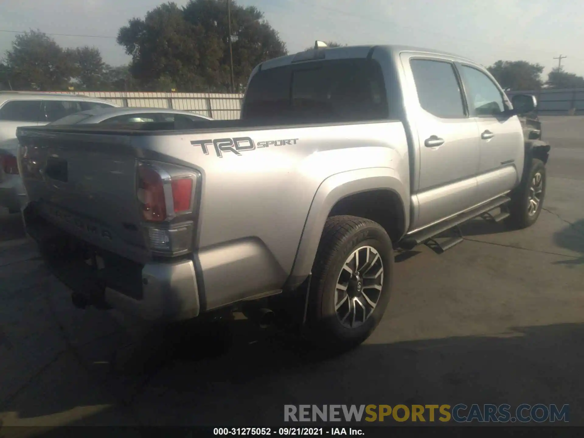 4 Photograph of a damaged car 3TMAZ5CN5LM118965 TOYOTA TACOMA 2WD 2020