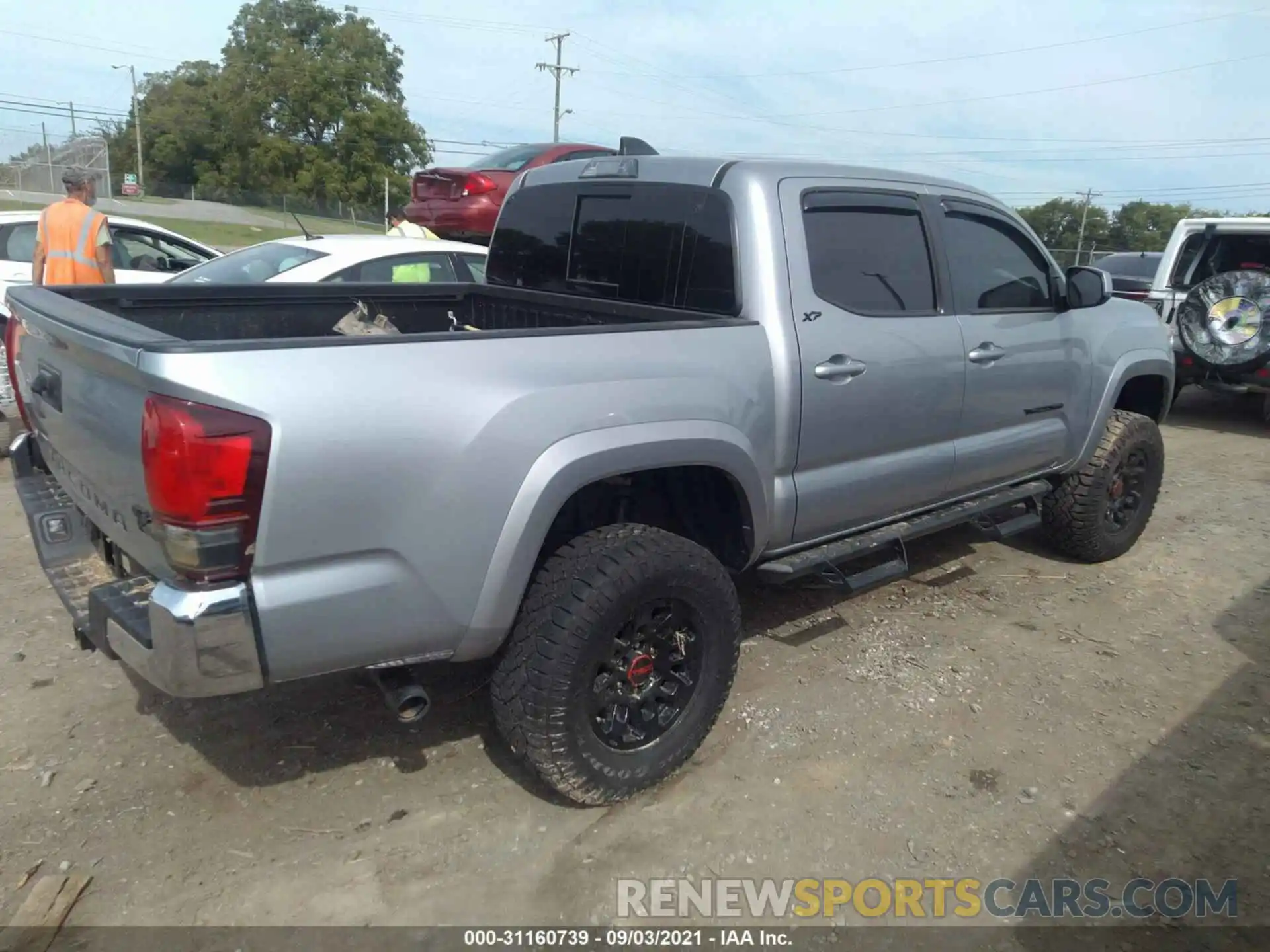 4 Photograph of a damaged car 3TMAZ5CN6LM132003 TOYOTA TACOMA 2WD 2020