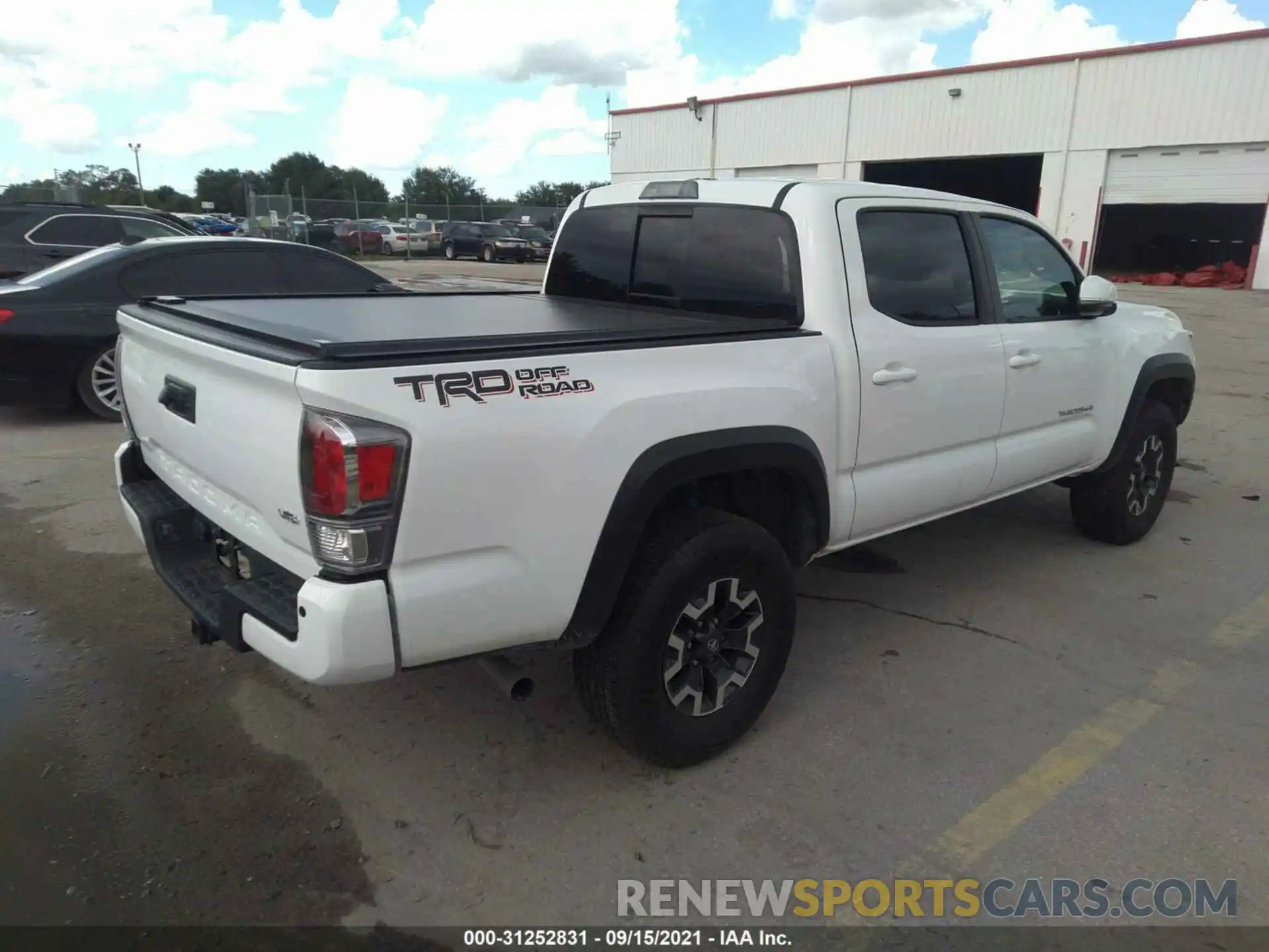 4 Photograph of a damaged car 3TMAZ5CN8LM127238 TOYOTA TACOMA 2WD 2020