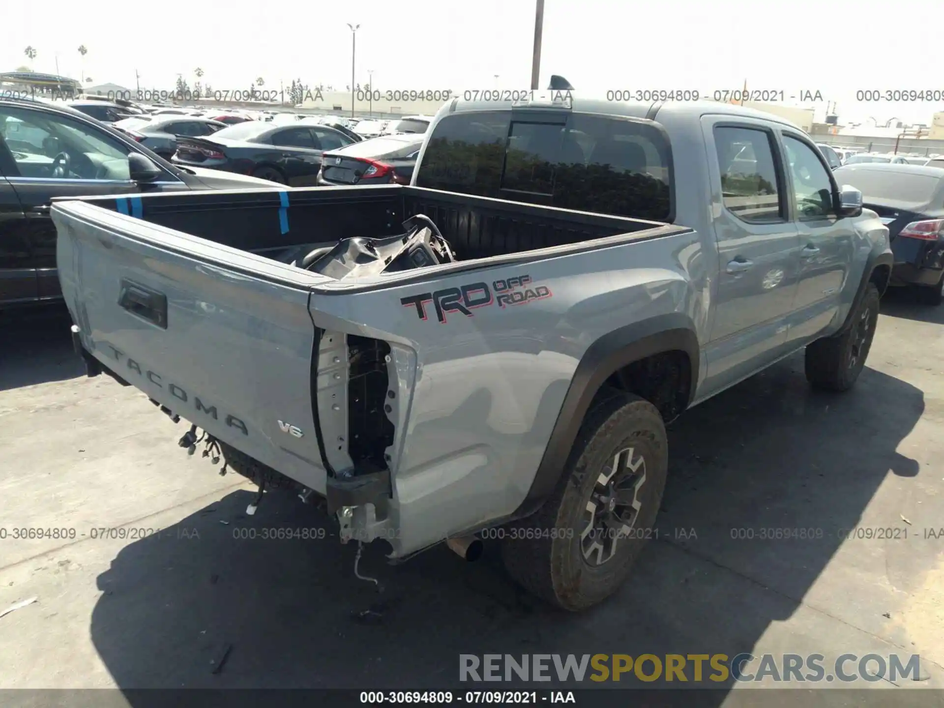 4 Photograph of a damaged car 3TMAZ5CN9LM137079 TOYOTA TACOMA 2WD 2020