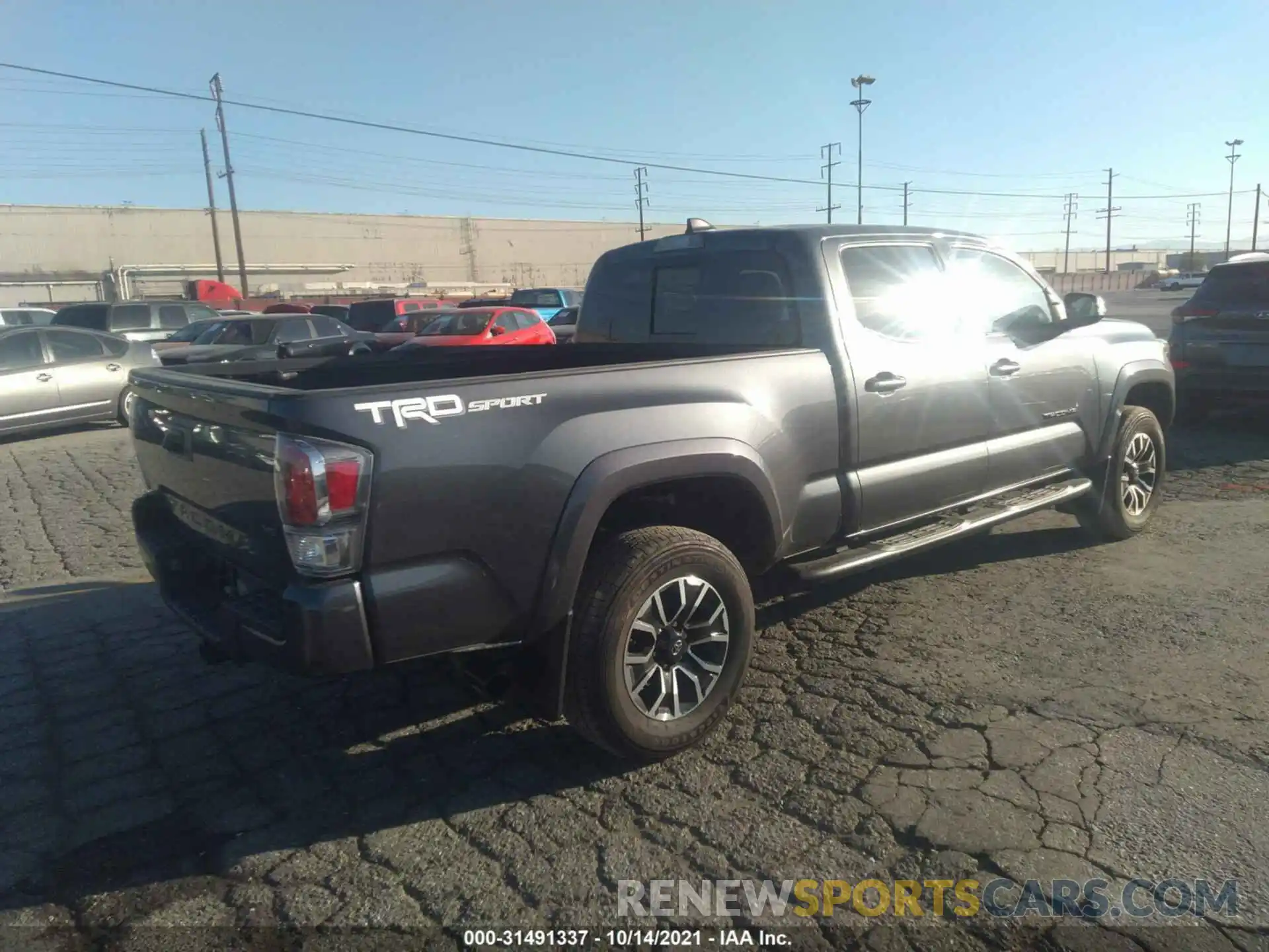 4 Photograph of a damaged car 3TMBZ5DN2LM027042 TOYOTA TACOMA 2WD 2020