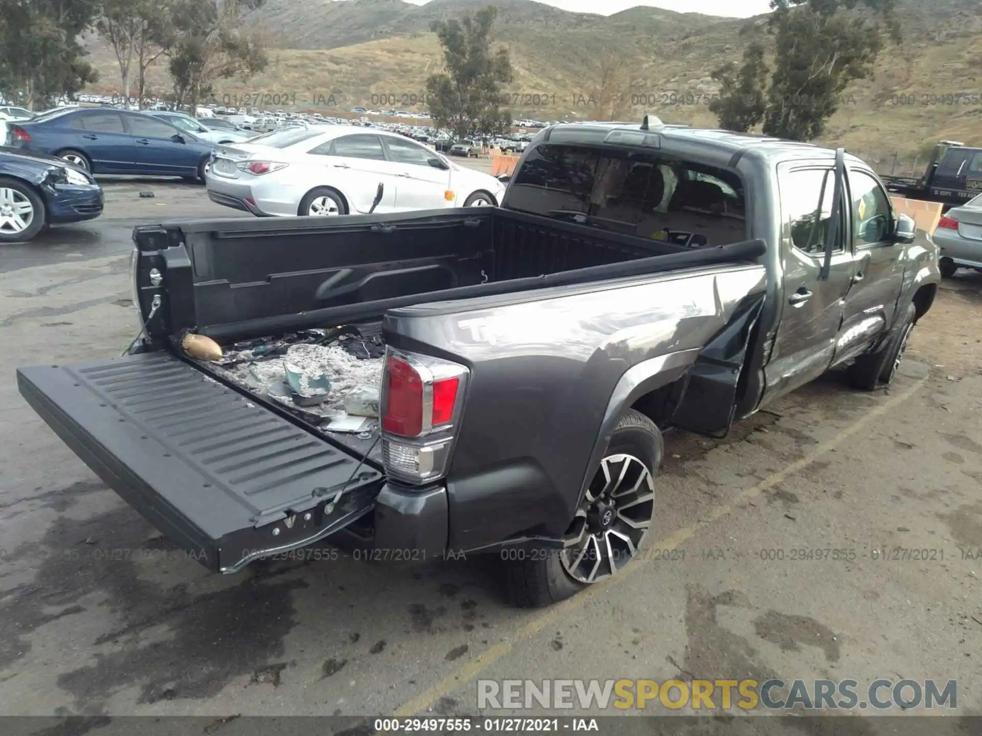 4 Photograph of a damaged car 3TMBZ5DN7LM023892 TOYOTA TACOMA 2WD 2020