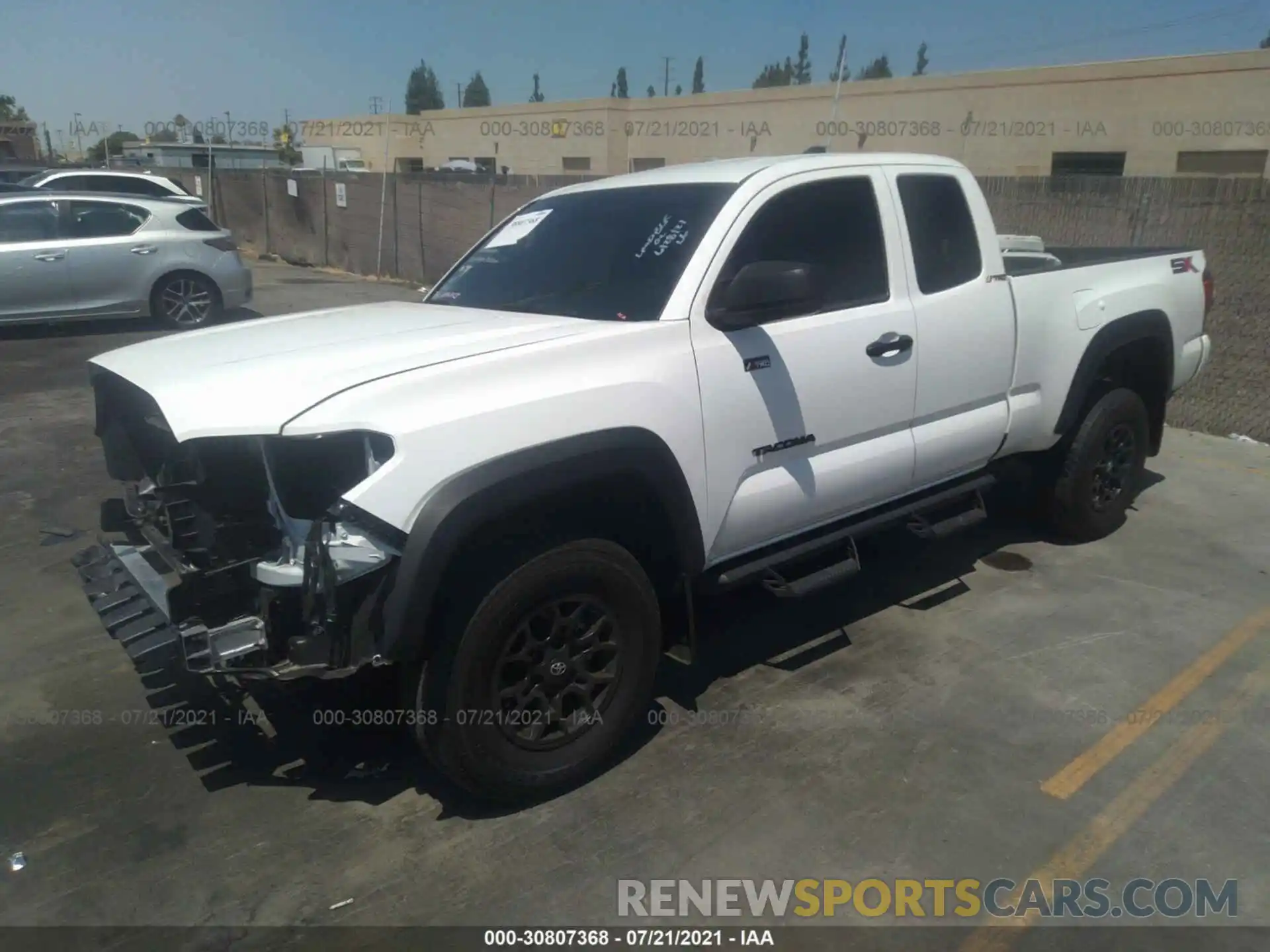 2 Photograph of a damaged car 3TYRX5GN1LT000547 TOYOTA TACOMA 2WD 2020