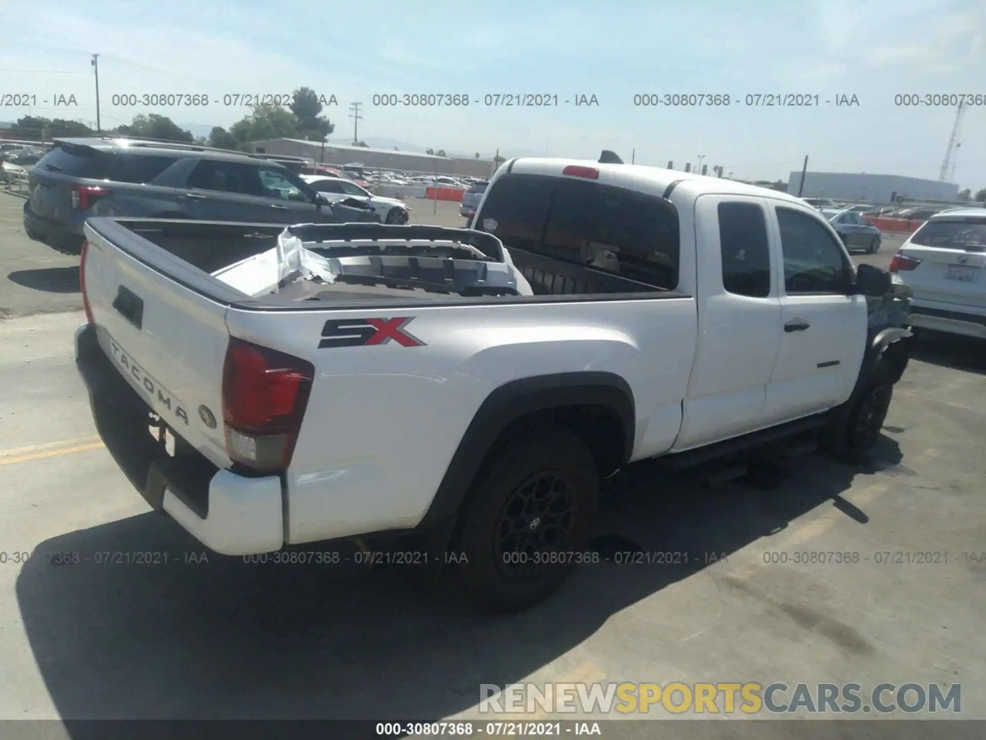 4 Photograph of a damaged car 3TYRX5GN1LT000547 TOYOTA TACOMA 2WD 2020