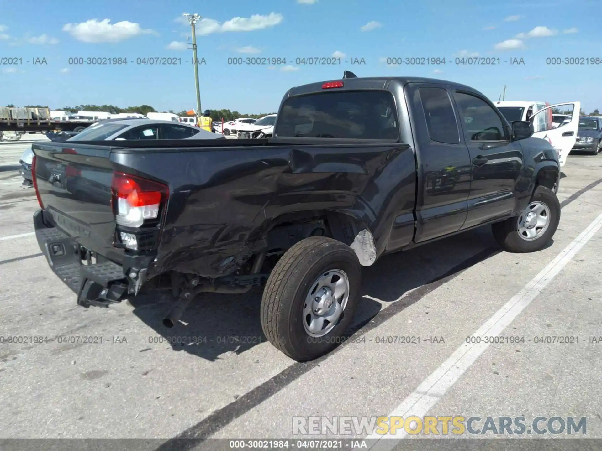 4 Photograph of a damaged car 3TYRX5GN1LT003643 TOYOTA TACOMA 2WD 2020