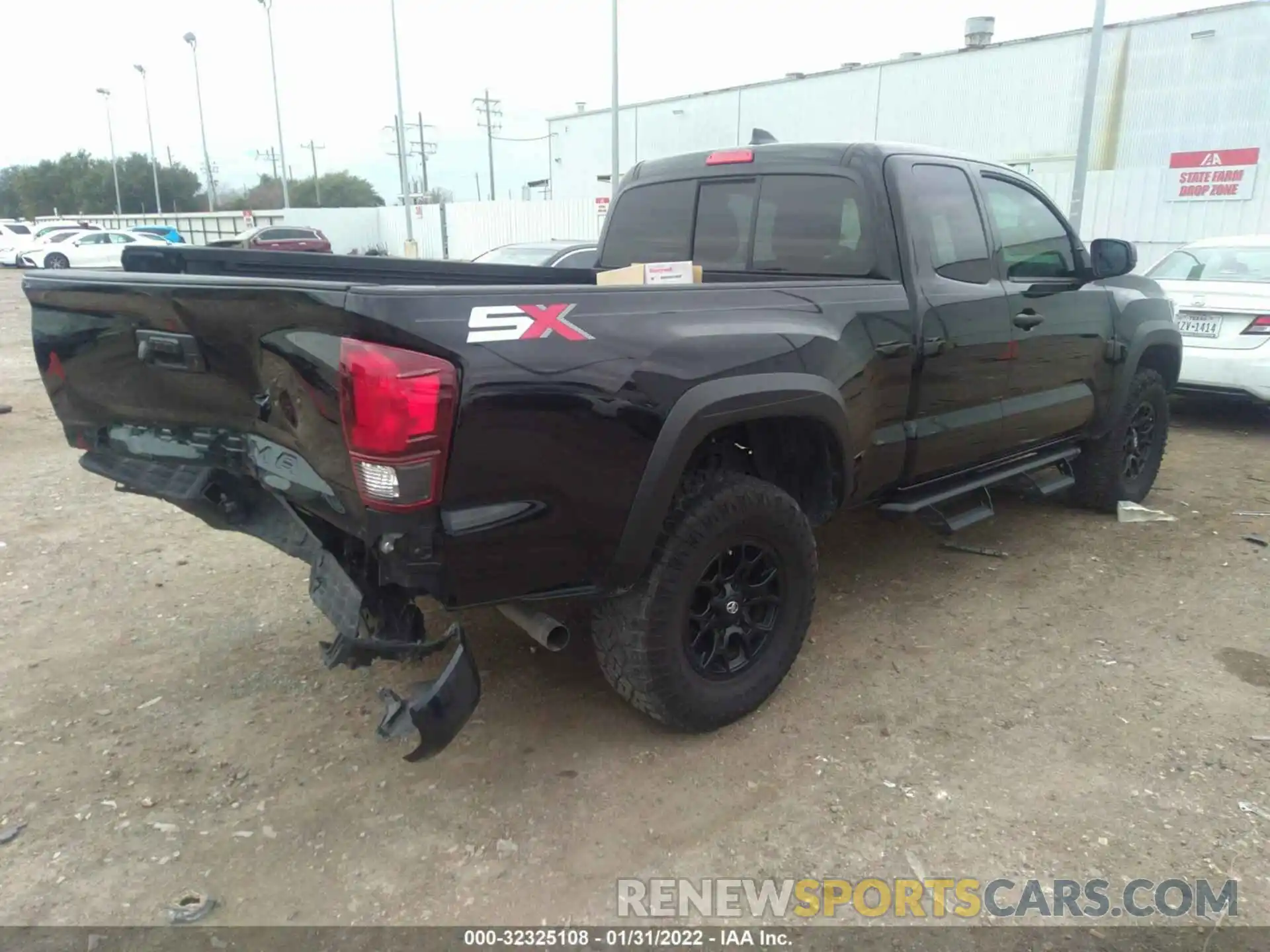 4 Photograph of a damaged car 3TYRX5GN2LT003649 TOYOTA TACOMA 2WD 2020