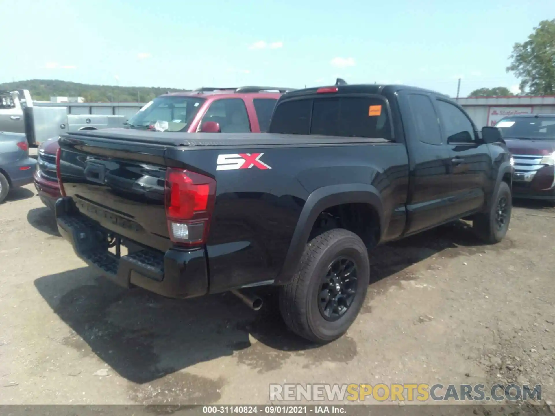 4 Photograph of a damaged car 3TYRX5GN3LT003479 TOYOTA TACOMA 2WD 2020