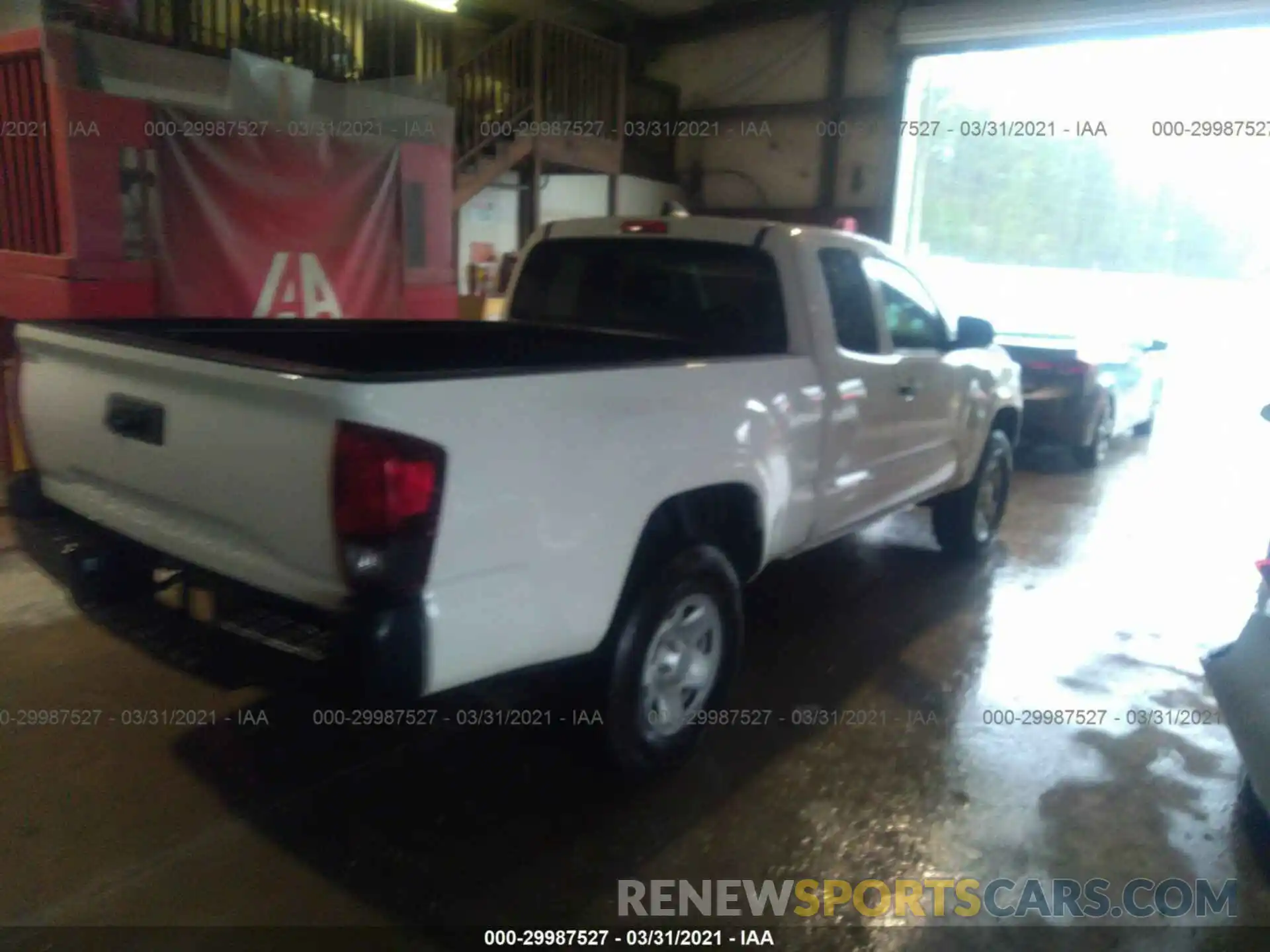 4 Photograph of a damaged car 3TYRX5GN7LT002934 TOYOTA TACOMA 2WD 2020