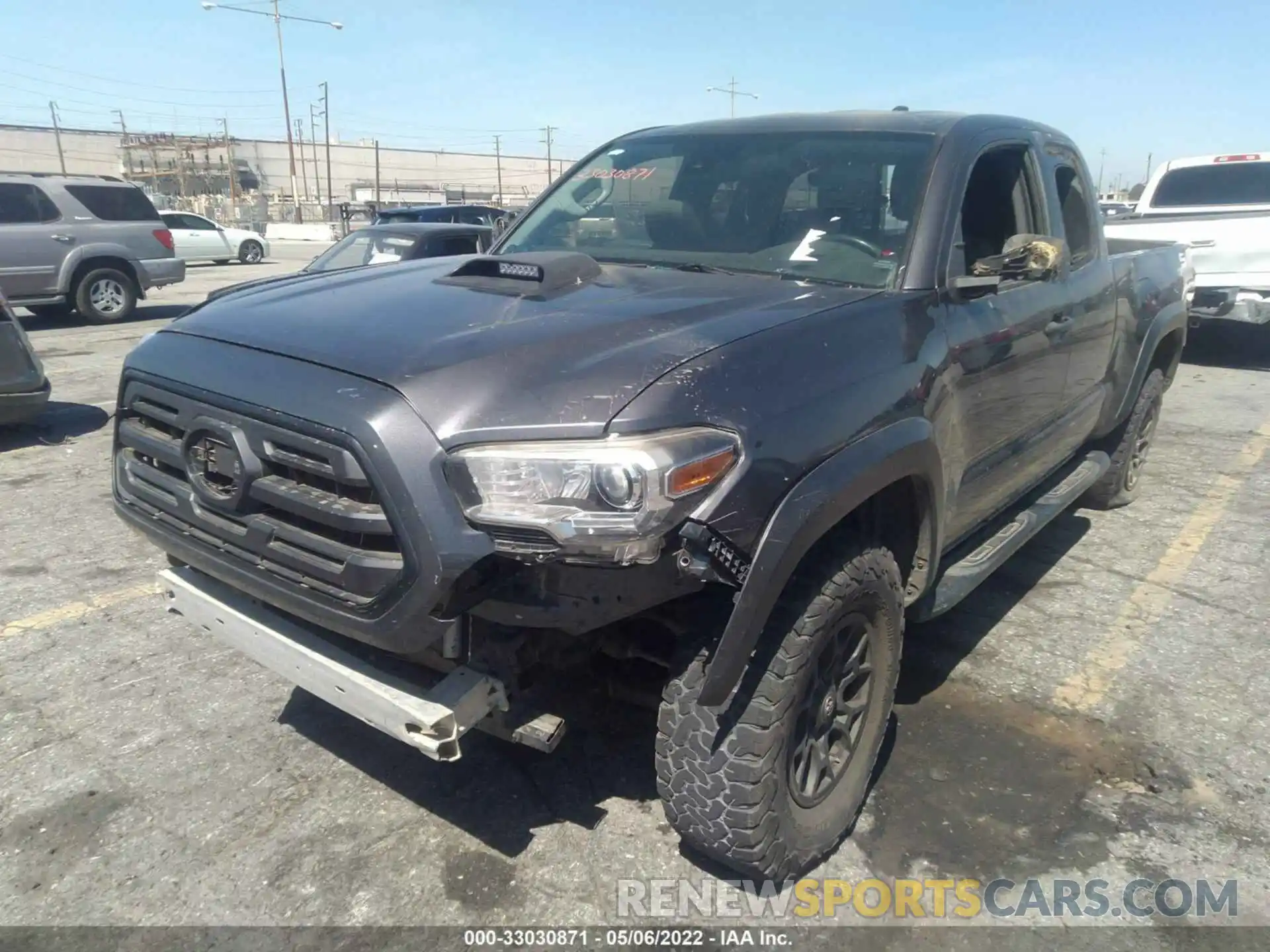 2 Photograph of a damaged car 3TYRX5GN9LT000215 TOYOTA TACOMA 2WD 2020