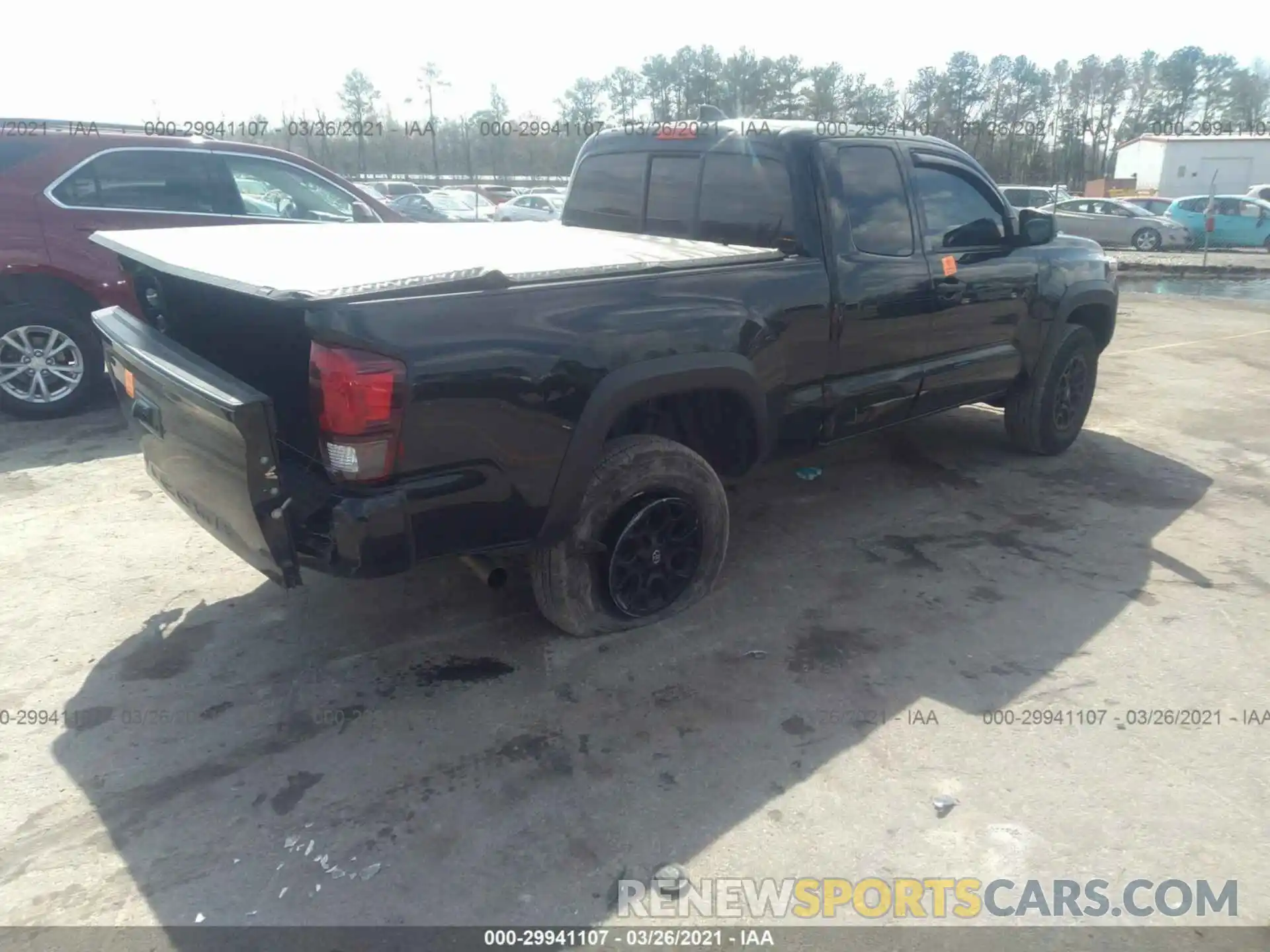 4 Photograph of a damaged car 3TYRZ5CN8LT000531 TOYOTA TACOMA 2WD 2020