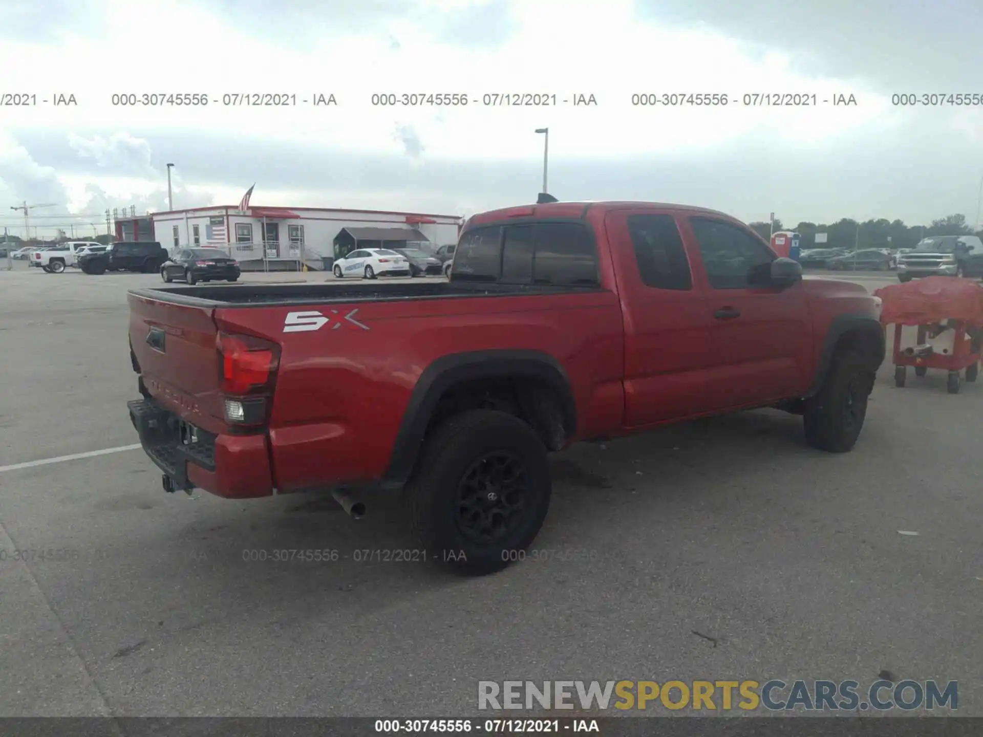 4 Photograph of a damaged car 3TYRZ5CNXLT002121 TOYOTA TACOMA 2WD 2020