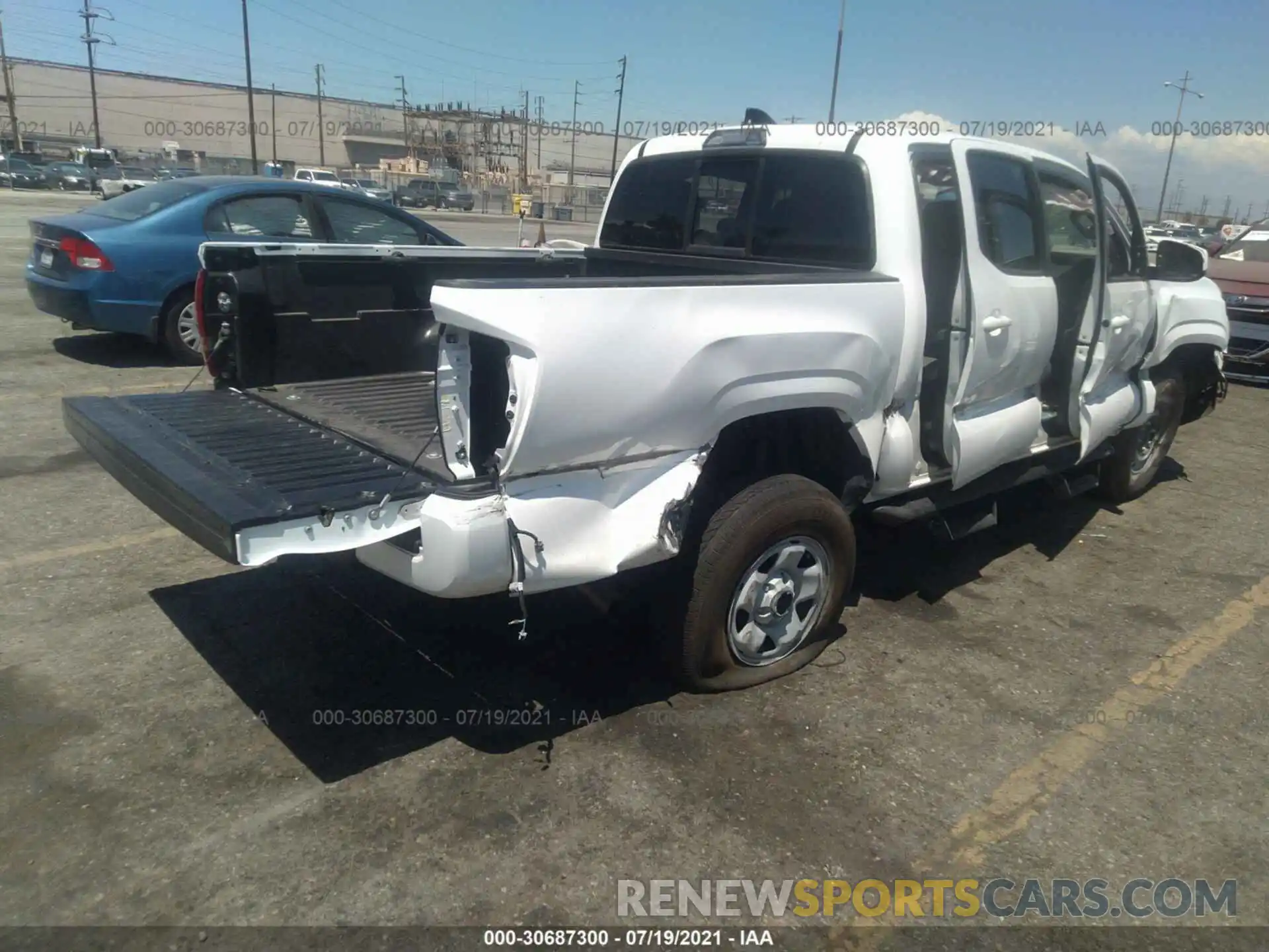 4 Photograph of a damaged car 5TFAX5GN3LX184862 TOYOTA TACOMA 2WD 2020