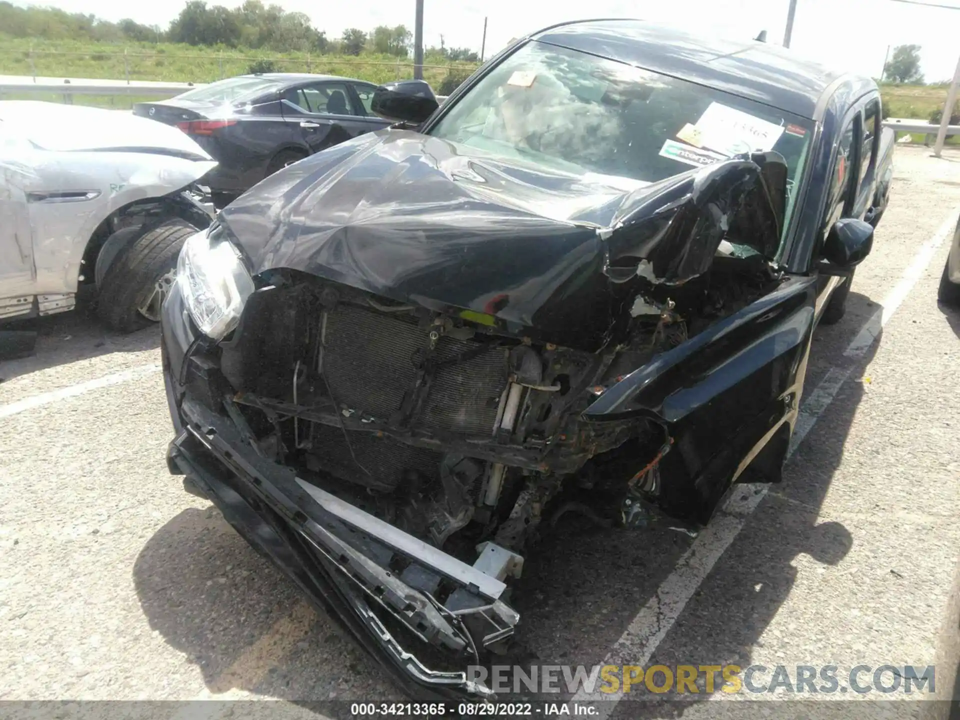 2 Photograph of a damaged car 5TFAX5GN4LX179329 TOYOTA TACOMA 2WD 2020