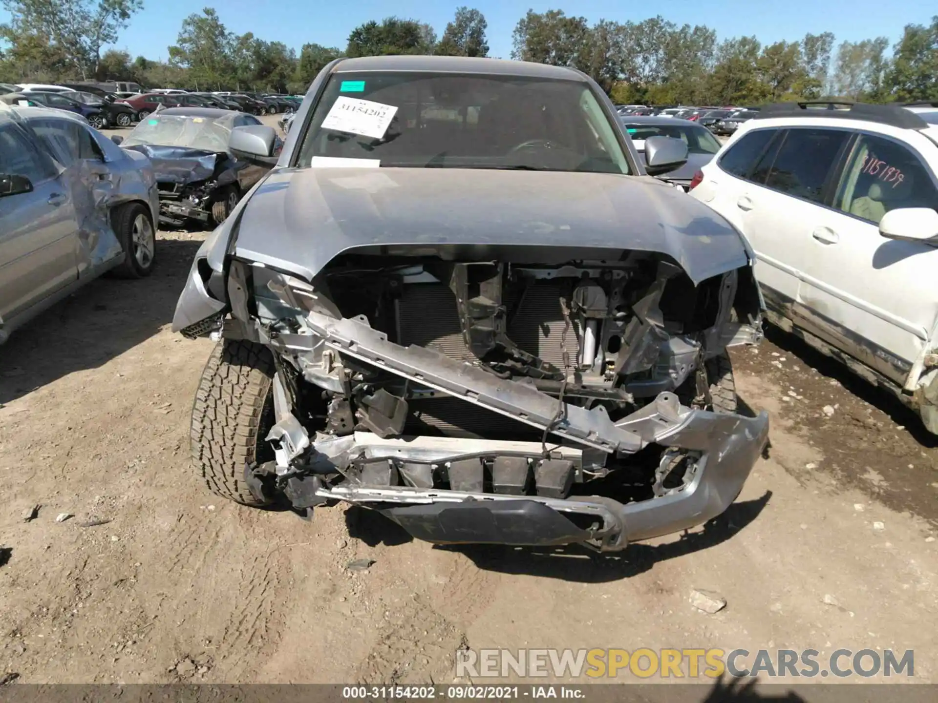 6 Photograph of a damaged car 5TFAX5GN6LX188419 TOYOTA TACOMA 2WD 2020