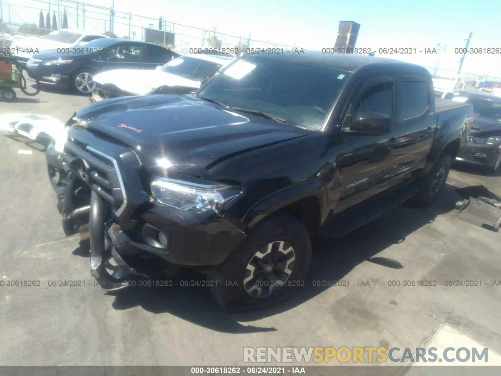 2 Photograph of a damaged car 5TFAX5GN7LX173945 TOYOTA TACOMA 2WD 2020