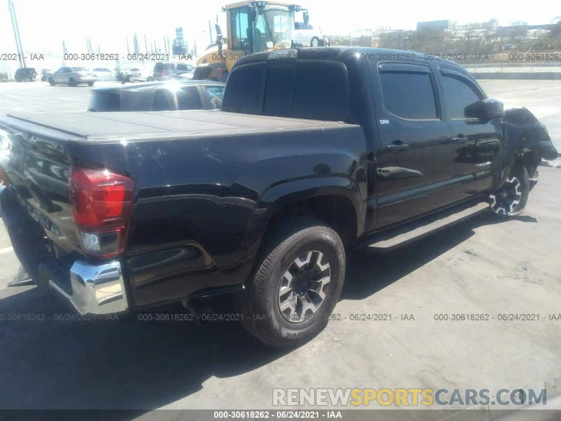 4 Photograph of a damaged car 5TFAX5GN7LX173945 TOYOTA TACOMA 2WD 2020