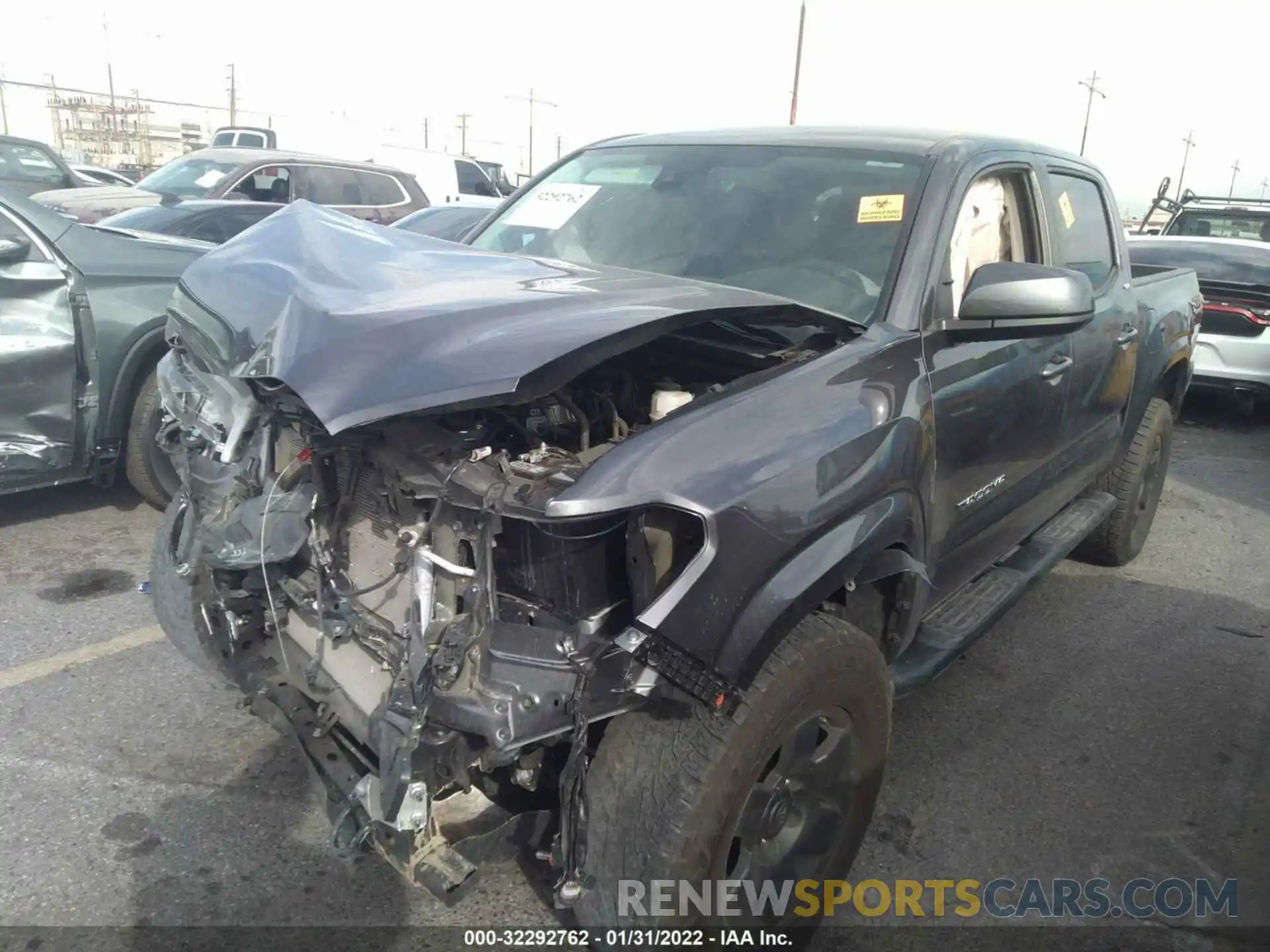 2 Photograph of a damaged car 5TFAX5GN7LX188543 TOYOTA TACOMA 2WD 2020