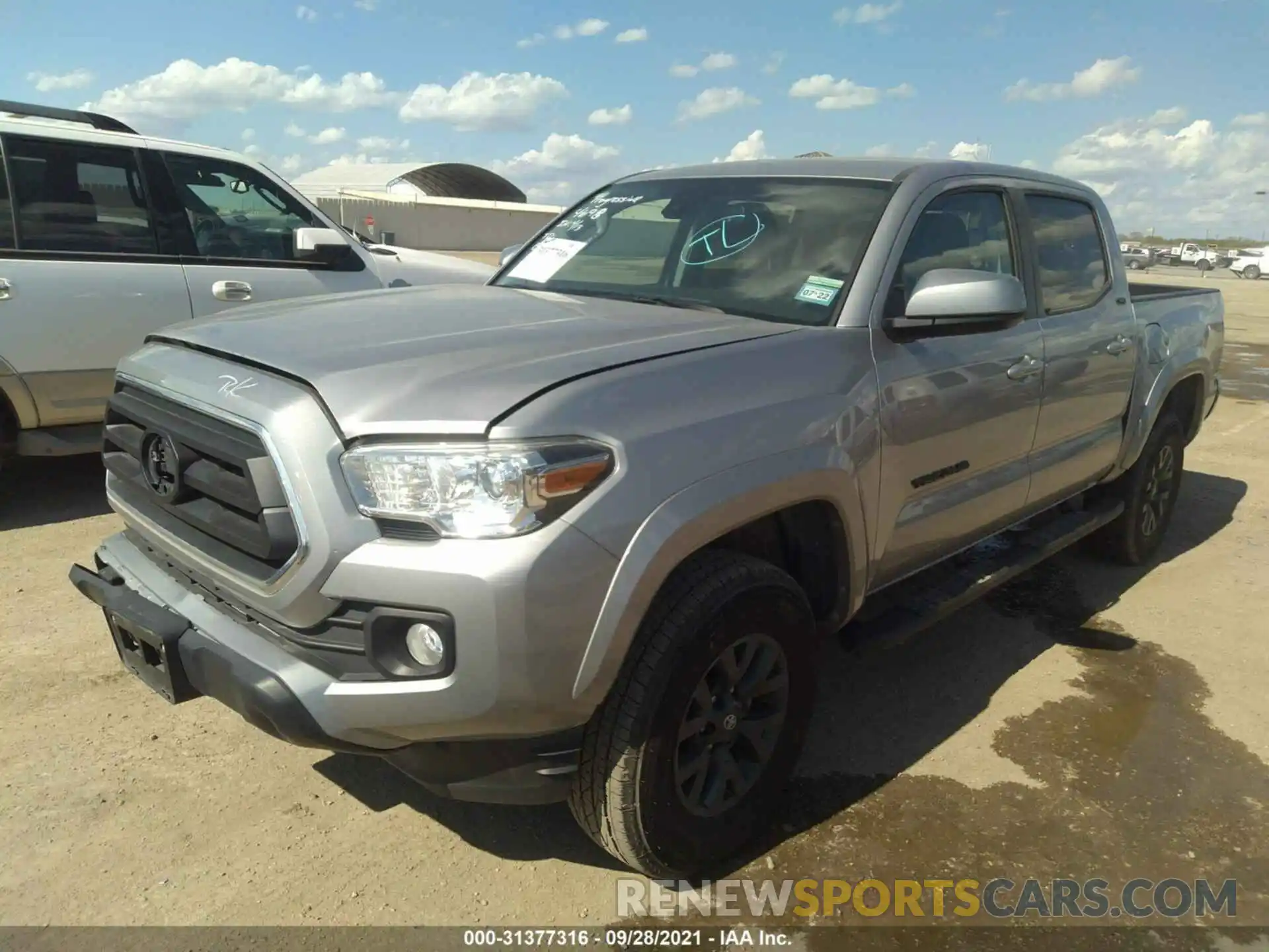 2 Photograph of a damaged car 5TFAZ5CN2LX094098 TOYOTA TACOMA 2WD 2020