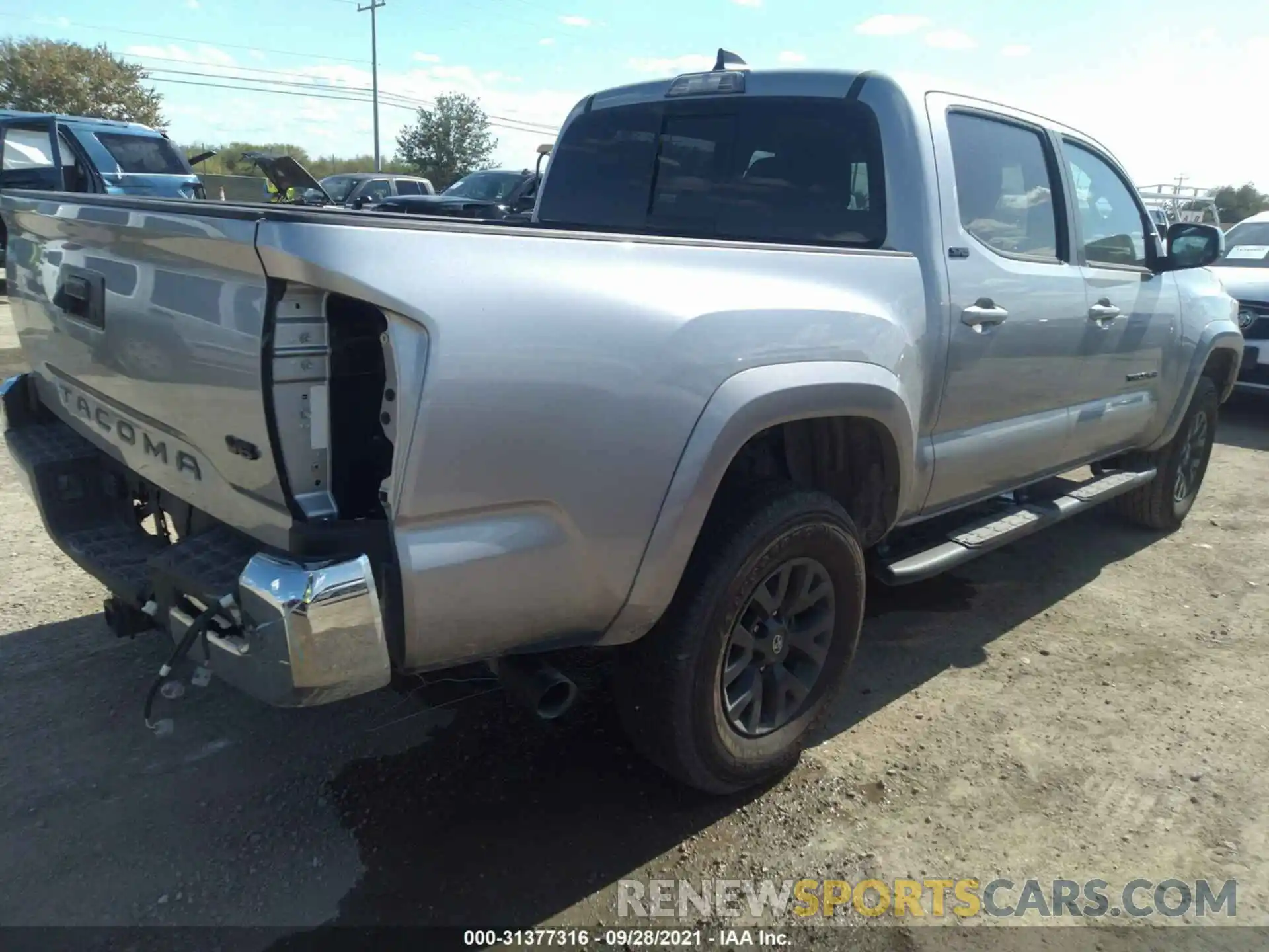 4 Photograph of a damaged car 5TFAZ5CN2LX094098 TOYOTA TACOMA 2WD 2020