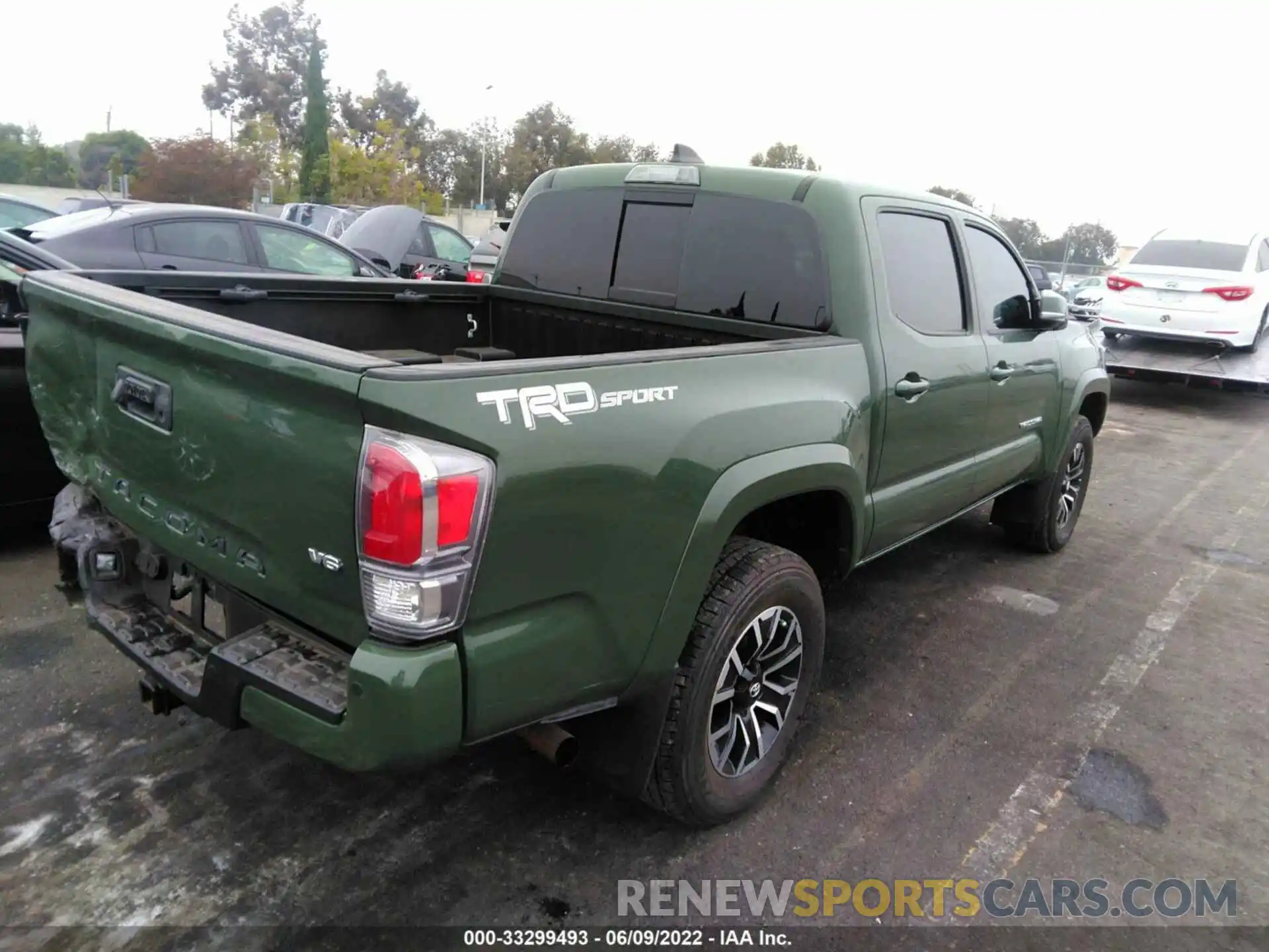 4 Photograph of a damaged car 3TMAZ5CN0MM141975 TOYOTA TACOMA 2WD 2021