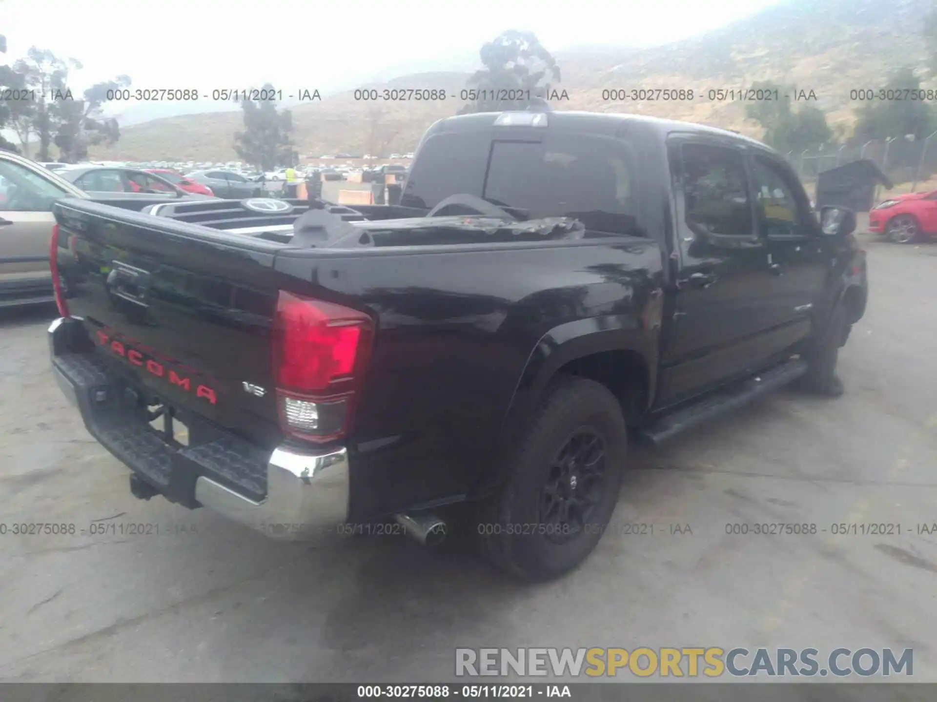 4 Photograph of a damaged car 3TMAZ5CN0MM145248 TOYOTA TACOMA 2WD 2021