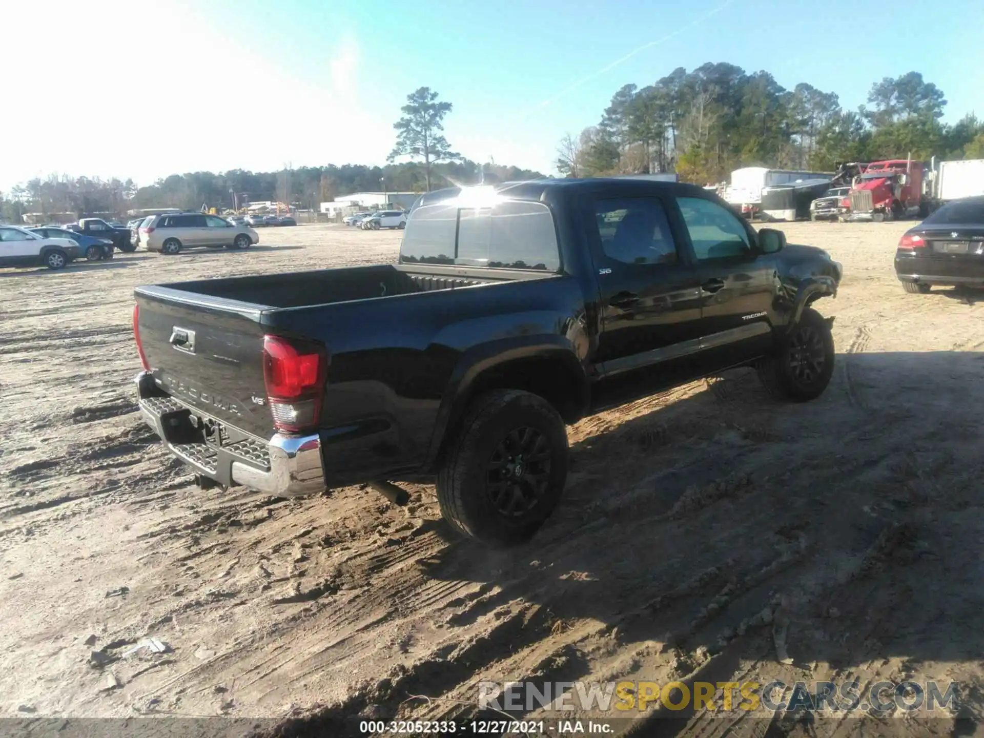 4 Photograph of a damaged car 3TMAZ5CN0MM151678 TOYOTA TACOMA 2WD 2021