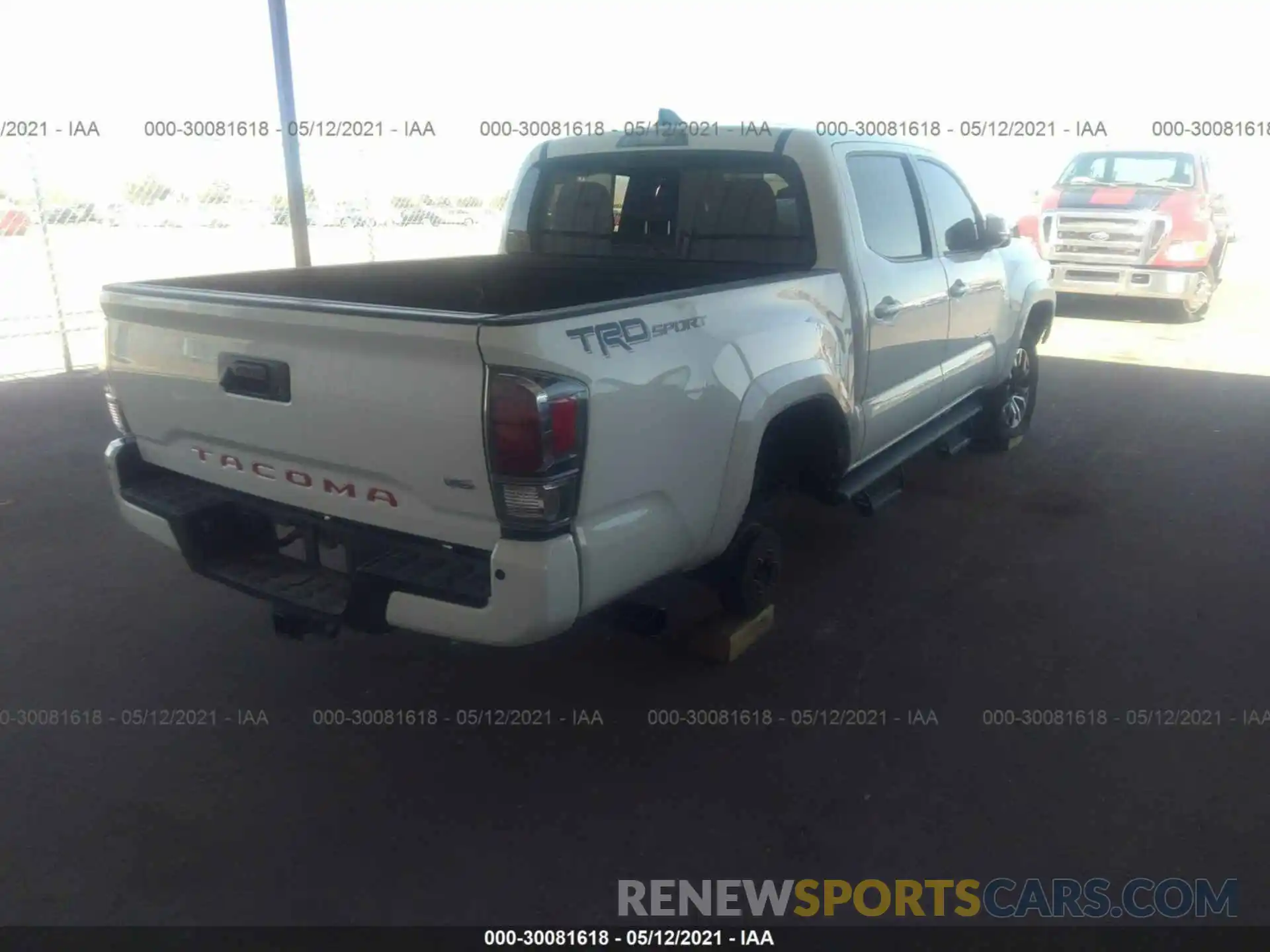 4 Photograph of a damaged car 3TMAZ5CN1MM143766 TOYOTA TACOMA 2WD 2021