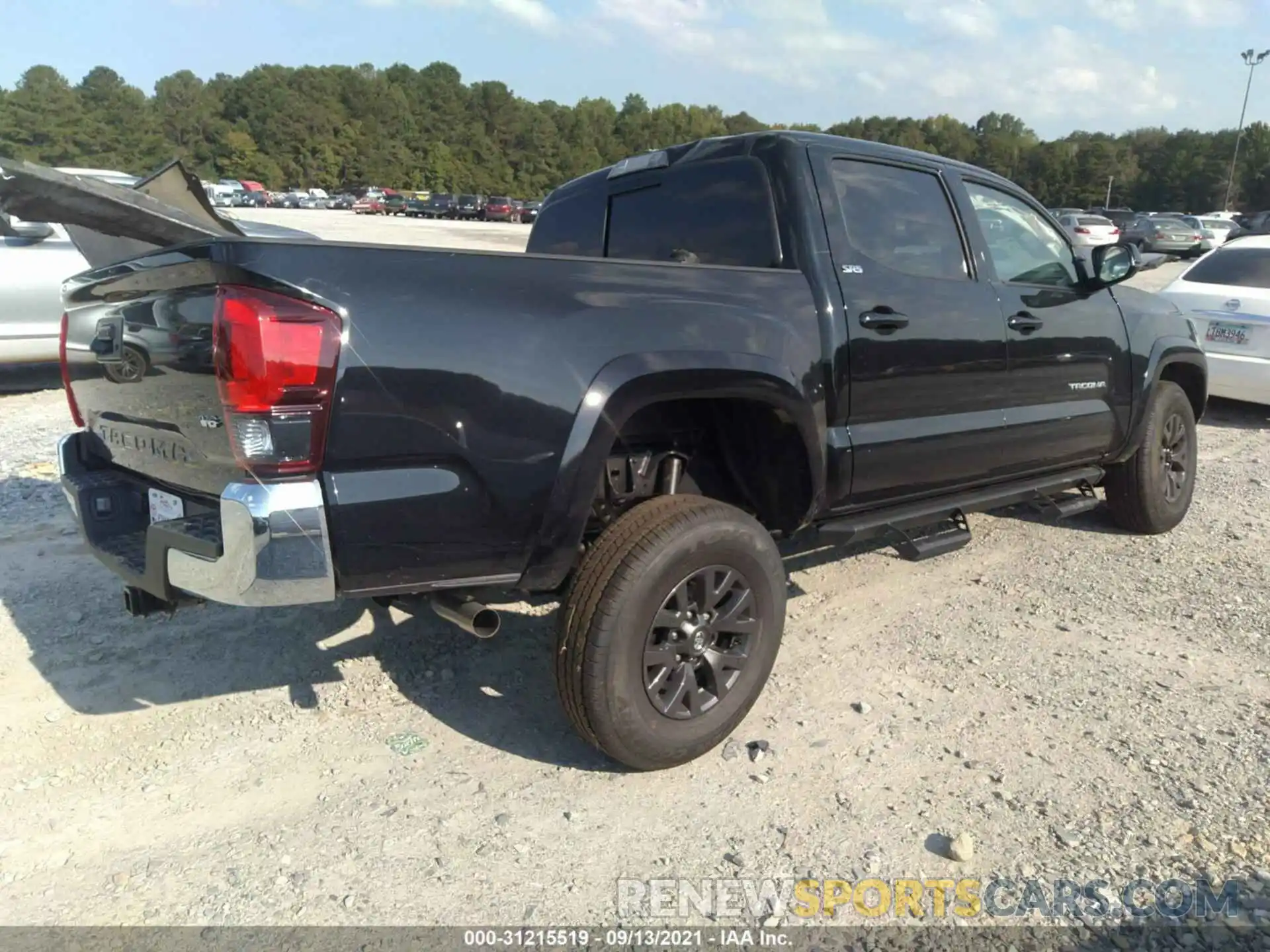 4 Photograph of a damaged car 3TMAZ5CN1MM156212 TOYOTA TACOMA 2WD 2021