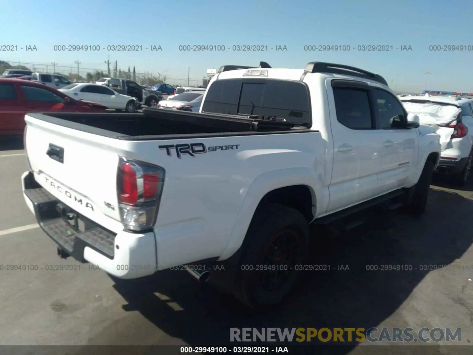 4 Photograph of a damaged car 3TMAZ5CN4MM145947 TOYOTA TACOMA 2WD 2021