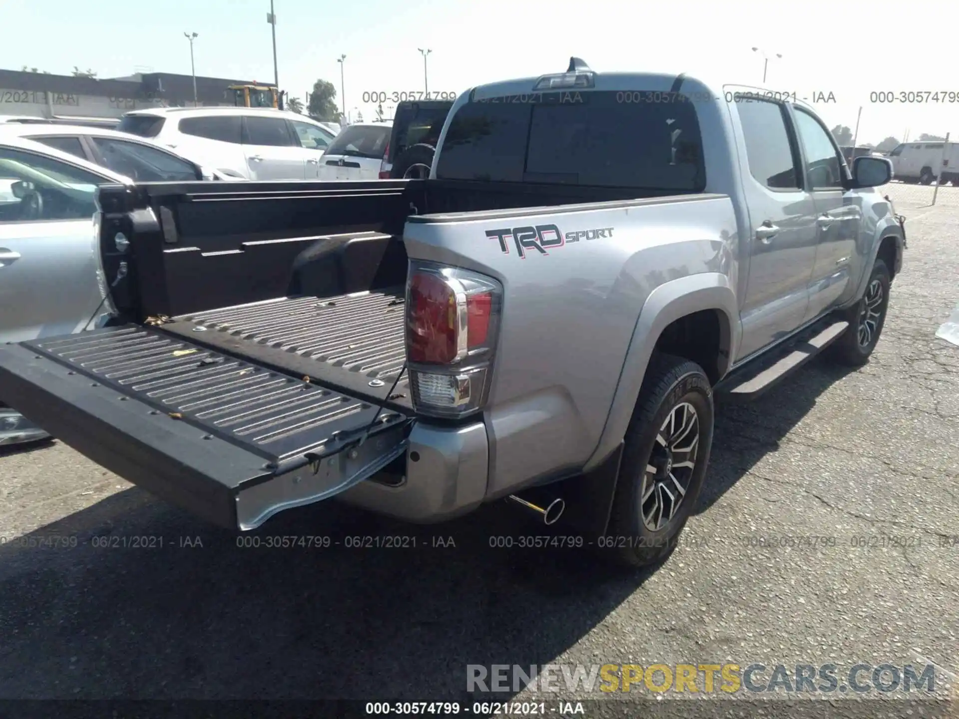 4 Photograph of a damaged car 3TMAZ5CN5MM154771 TOYOTA TACOMA 2WD 2021