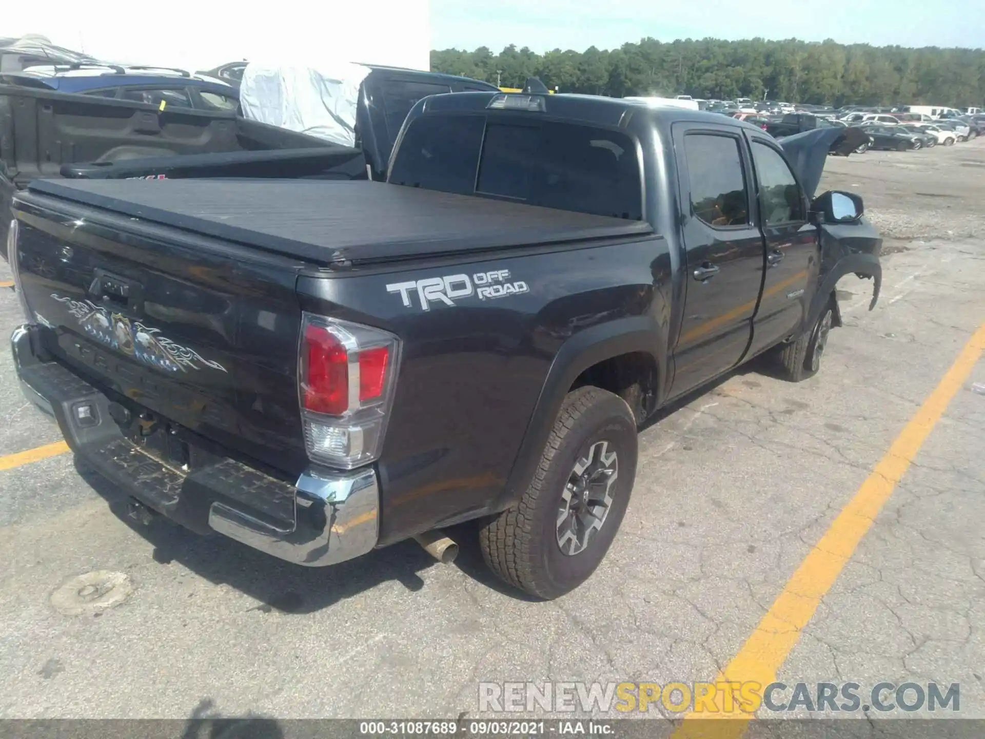 4 Photograph of a damaged car 3TMAZ5CN6MM141771 TOYOTA TACOMA 2WD 2021