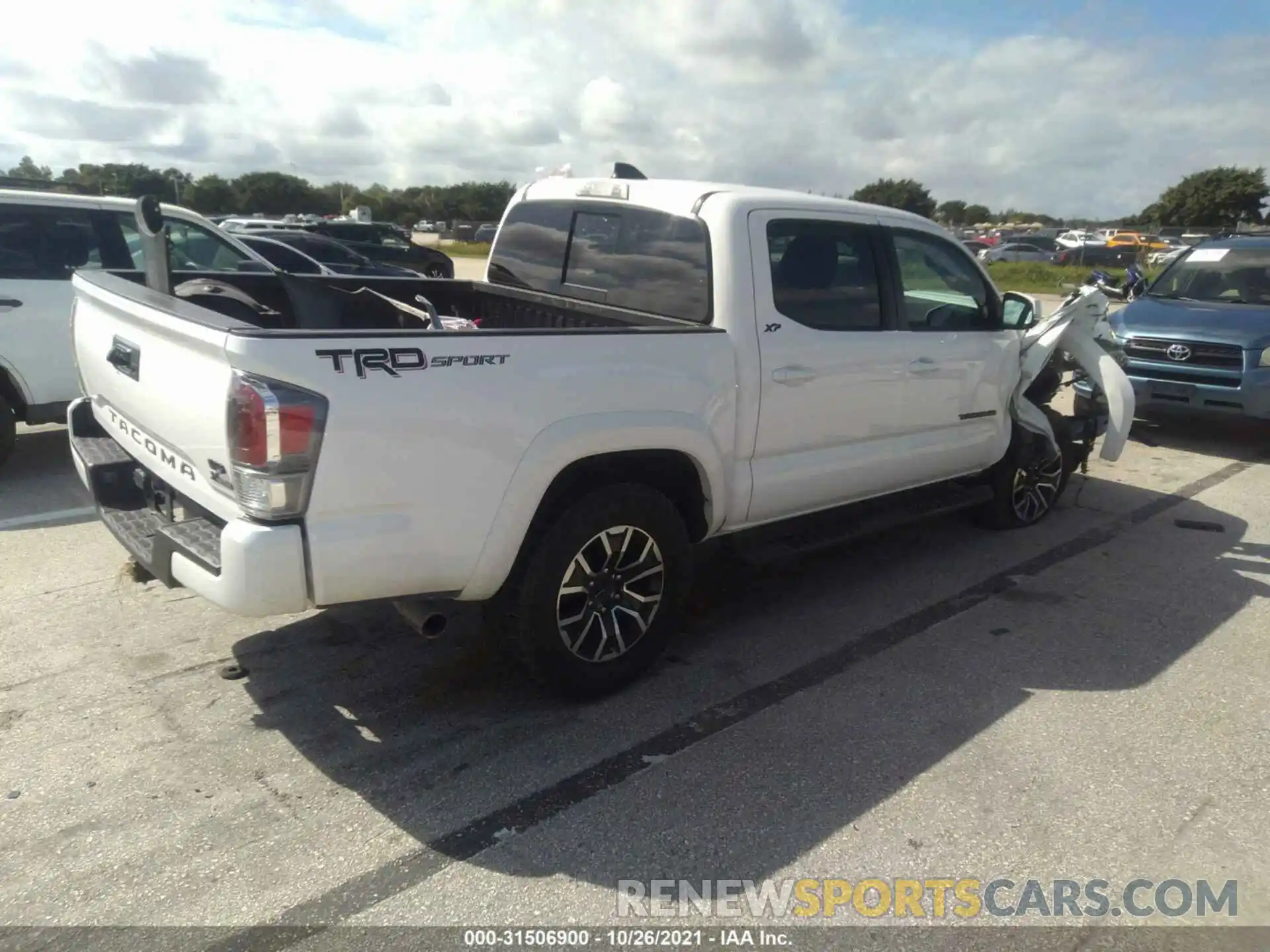 4 Photograph of a damaged car 3TMAZ5CN7MM148809 TOYOTA TACOMA 2WD 2021