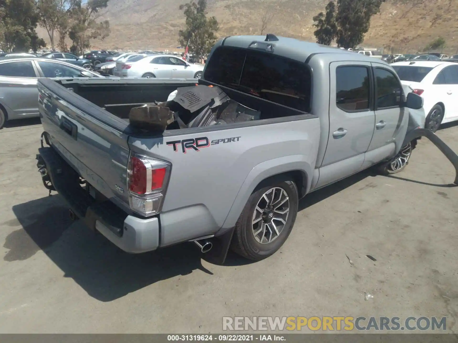 4 Photograph of a damaged car 3TMAZ5CN9MM155762 TOYOTA TACOMA 2WD 2021