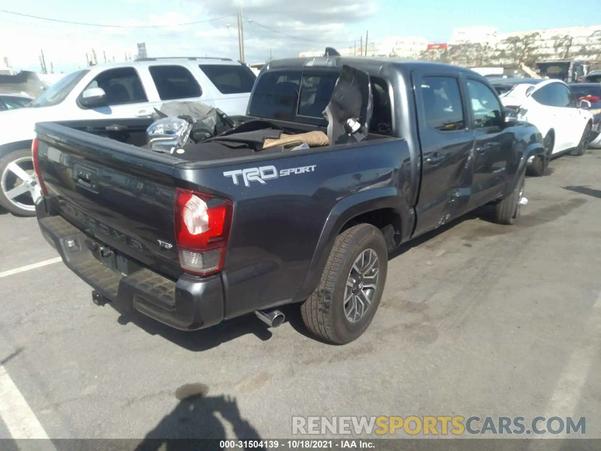 4 Photograph of a damaged car 3TMAZ5CNXMM148173 TOYOTA TACOMA 2WD 2021