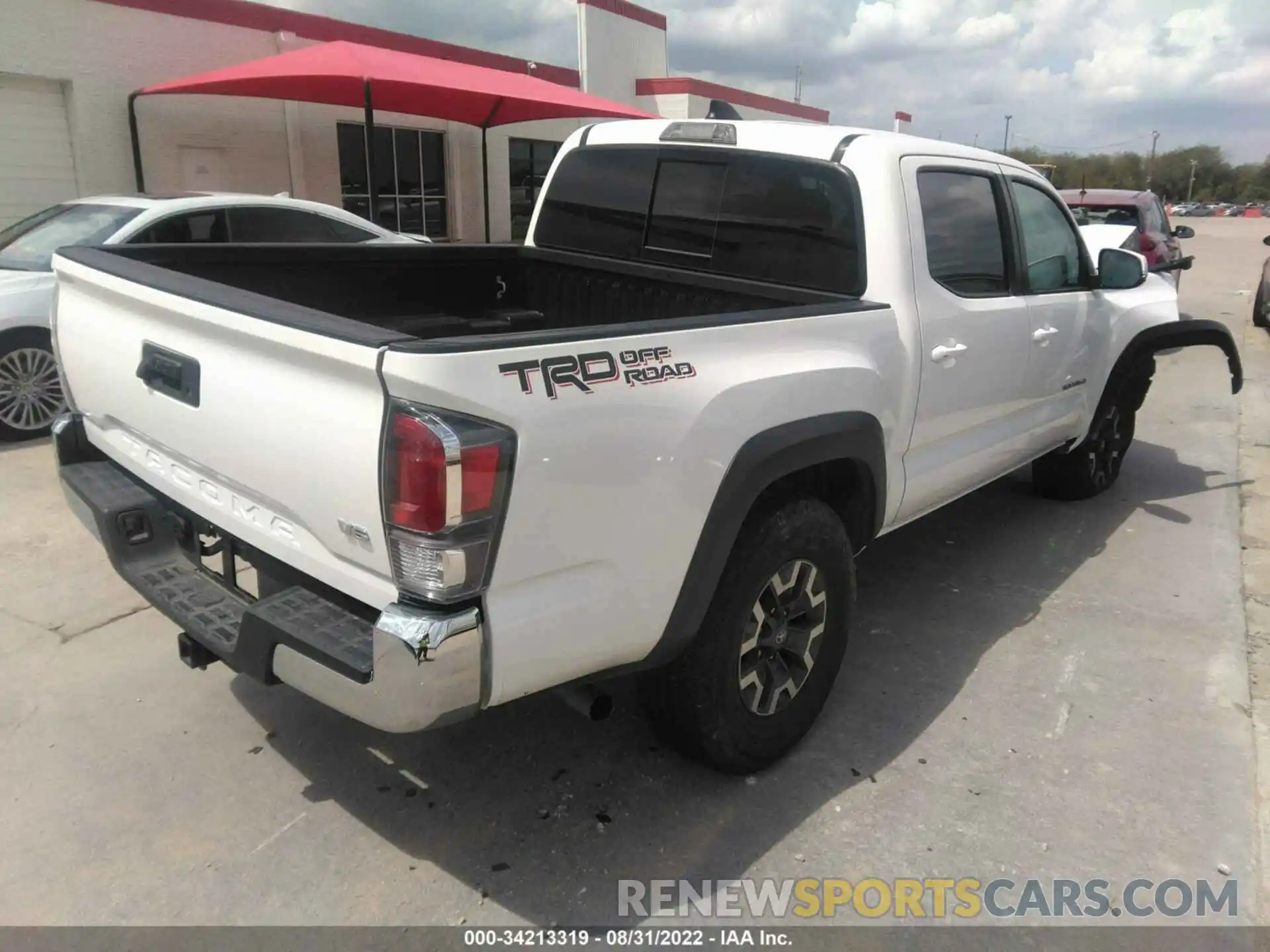 4 Photograph of a damaged car 3TMAZ5CNXMM149551 TOYOTA TACOMA 2WD 2021