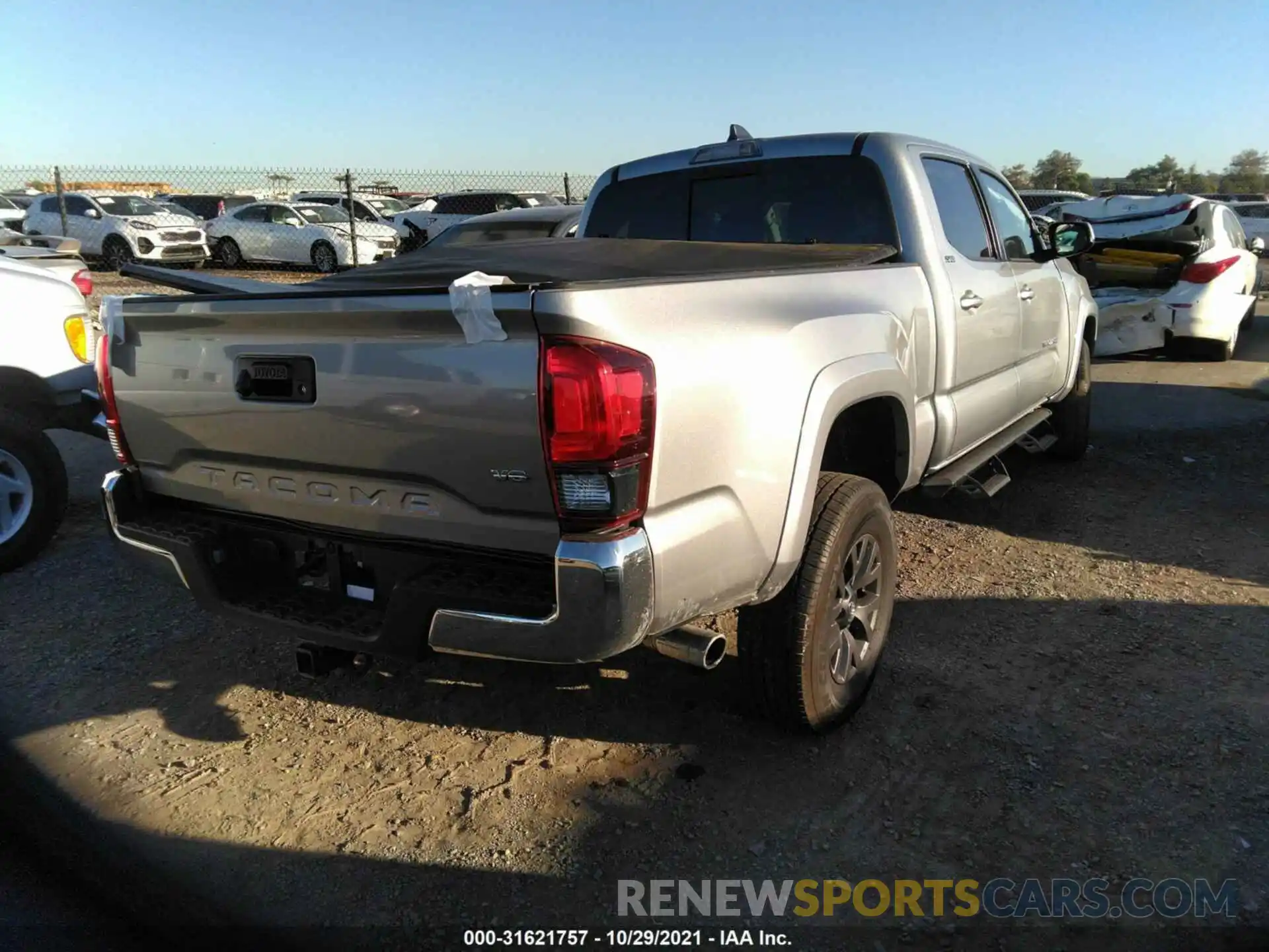 4 Photograph of a damaged car 3TMBZ5DN7MM029158 TOYOTA TACOMA 2WD 2021