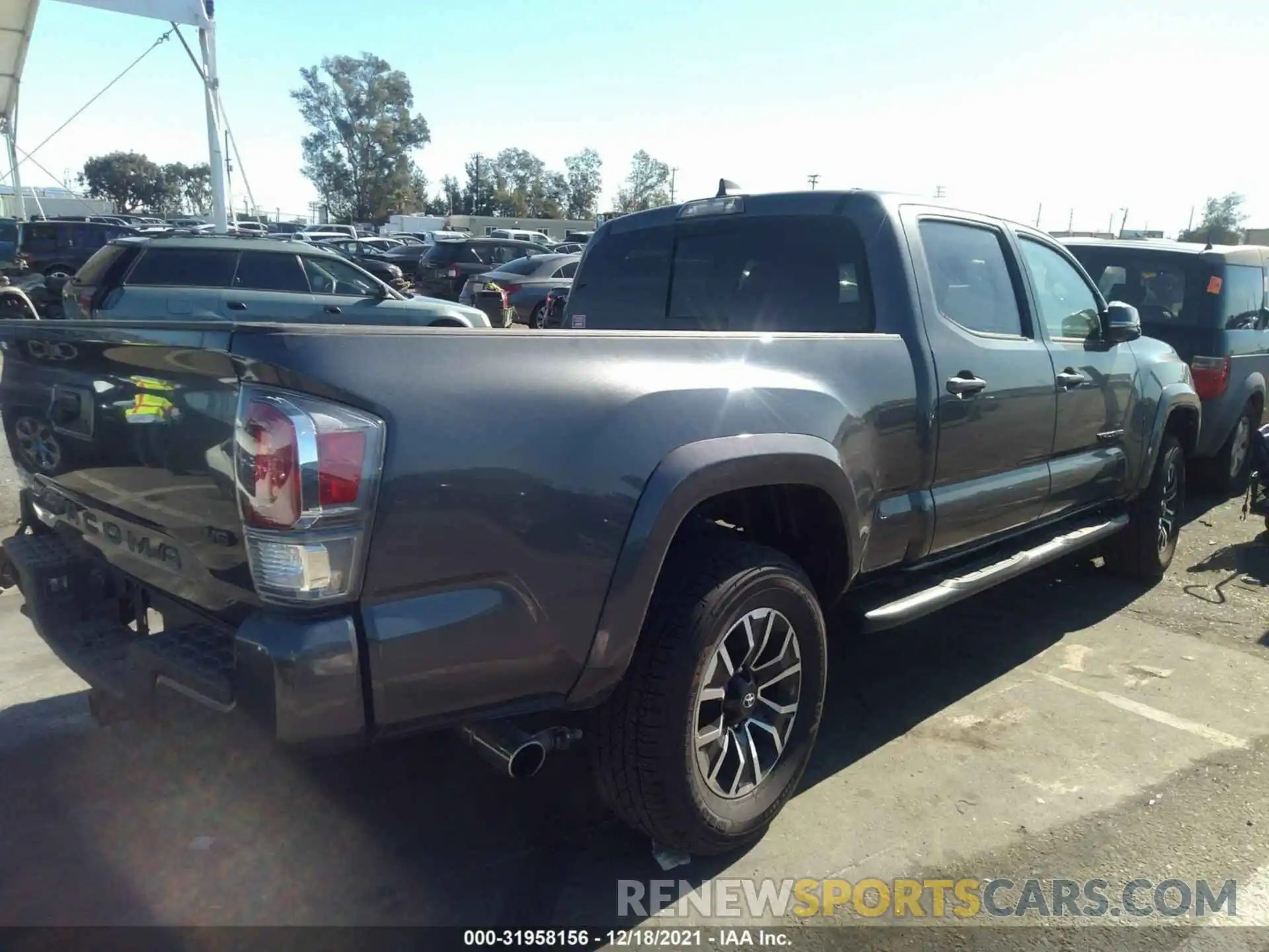 4 Photograph of a damaged car 3TMBZ5DN9MM030313 TOYOTA TACOMA 2WD 2021