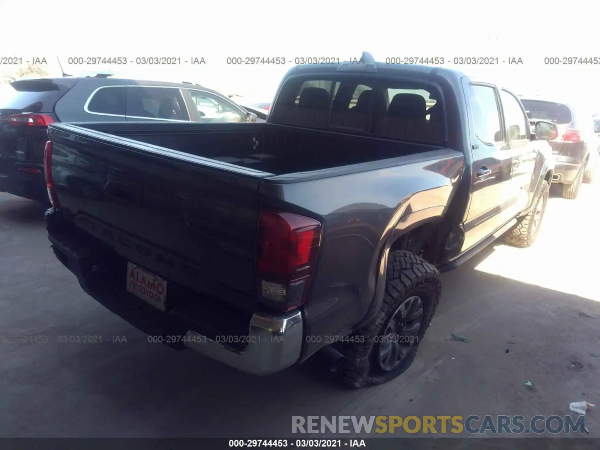 4 Photograph of a damaged car 3TYAX5GN2MT012107 TOYOTA TACOMA 2WD 2021