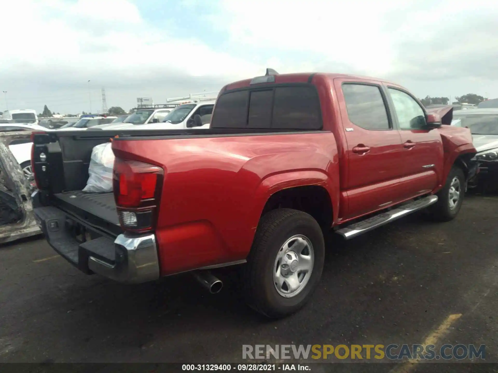 4 Photograph of a damaged car 3TYAX5GN4MT015283 TOYOTA TACOMA 2WD 2021