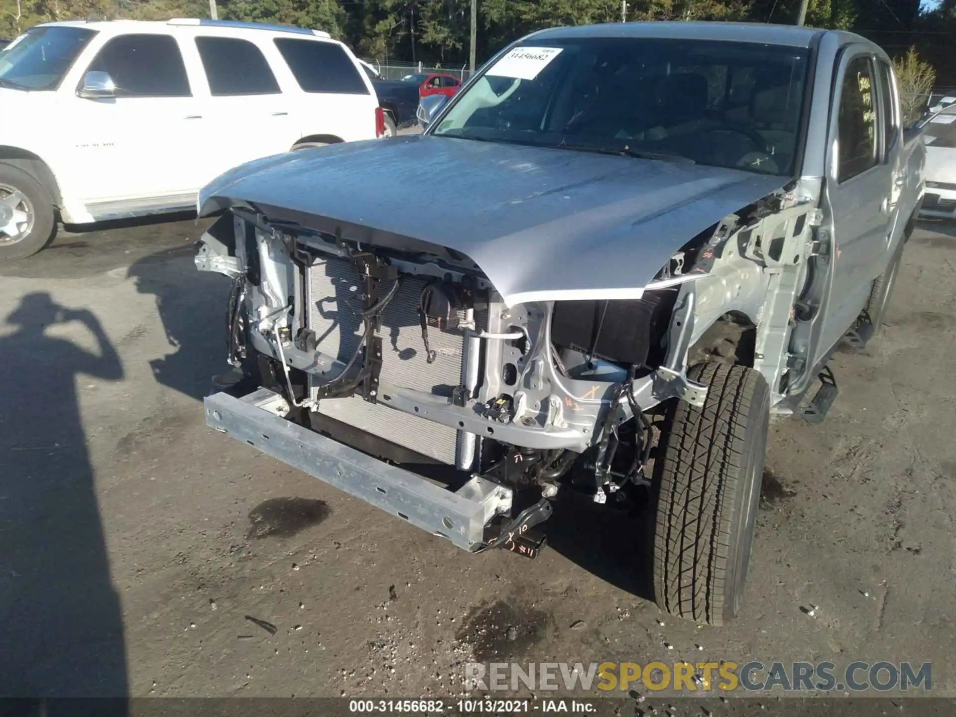 6 Photograph of a damaged car 3TYAX5GN5MT021593 TOYOTA TACOMA 2WD 2021