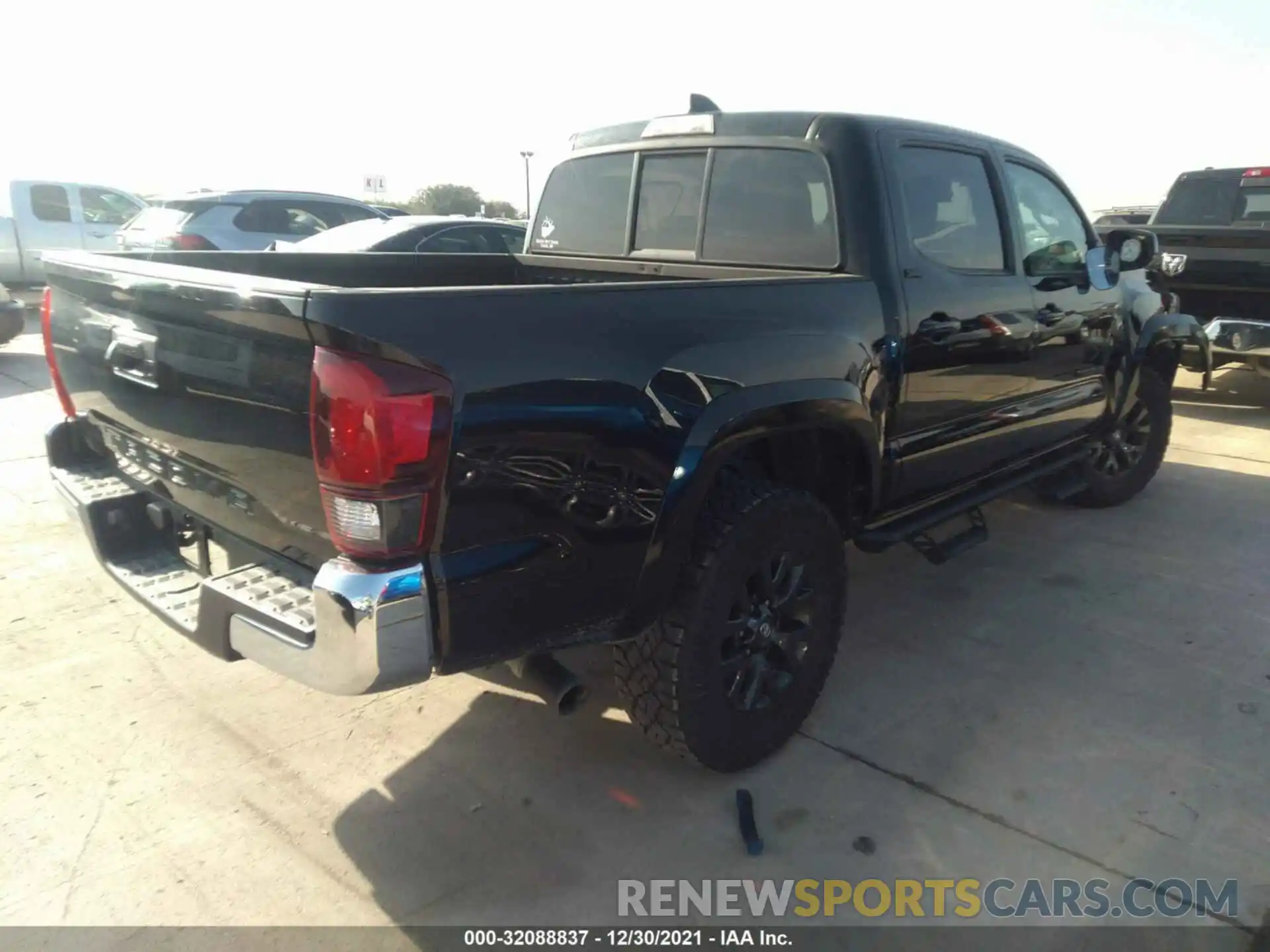 4 Photograph of a damaged car 3TYAX5GN6MT013308 TOYOTA TACOMA 2WD 2021