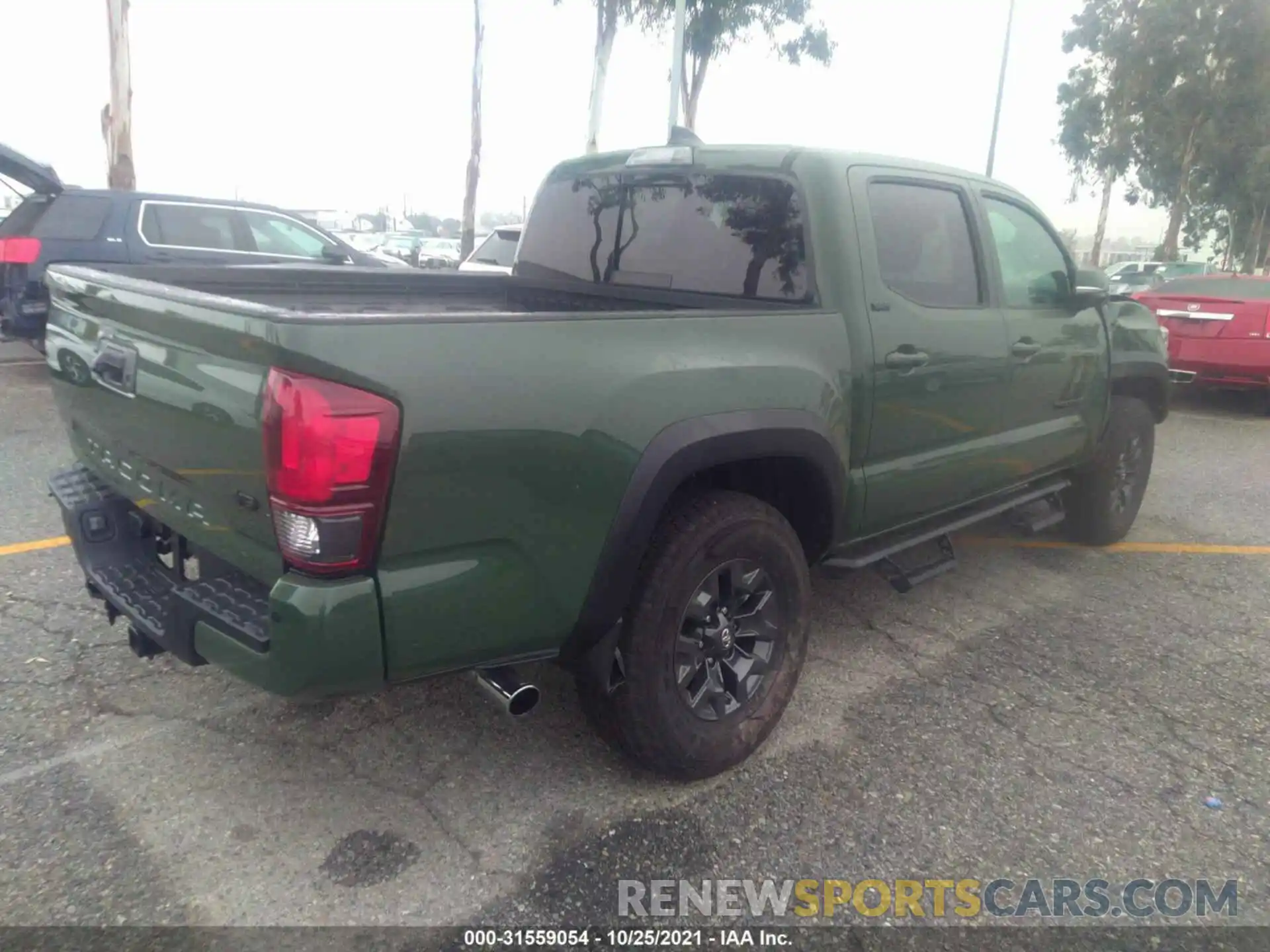 4 Photograph of a damaged car 3TYAZ5CN9MT005011 TOYOTA TACOMA 2WD 2021