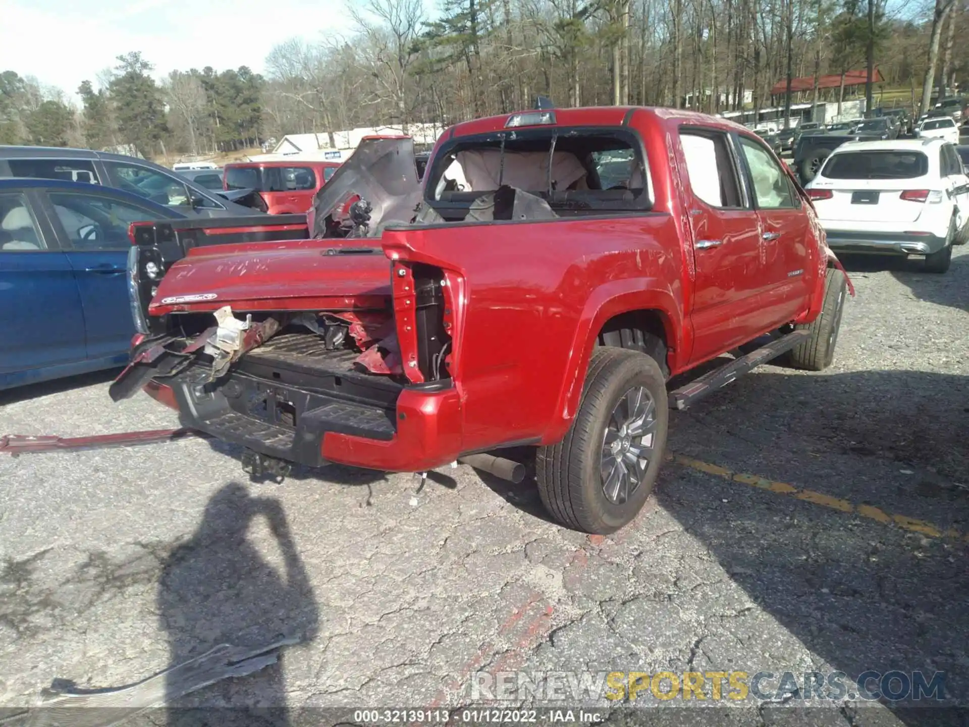 4 Photograph of a damaged car 3TYEZ5CN4MT010621 TOYOTA TACOMA 2WD 2021