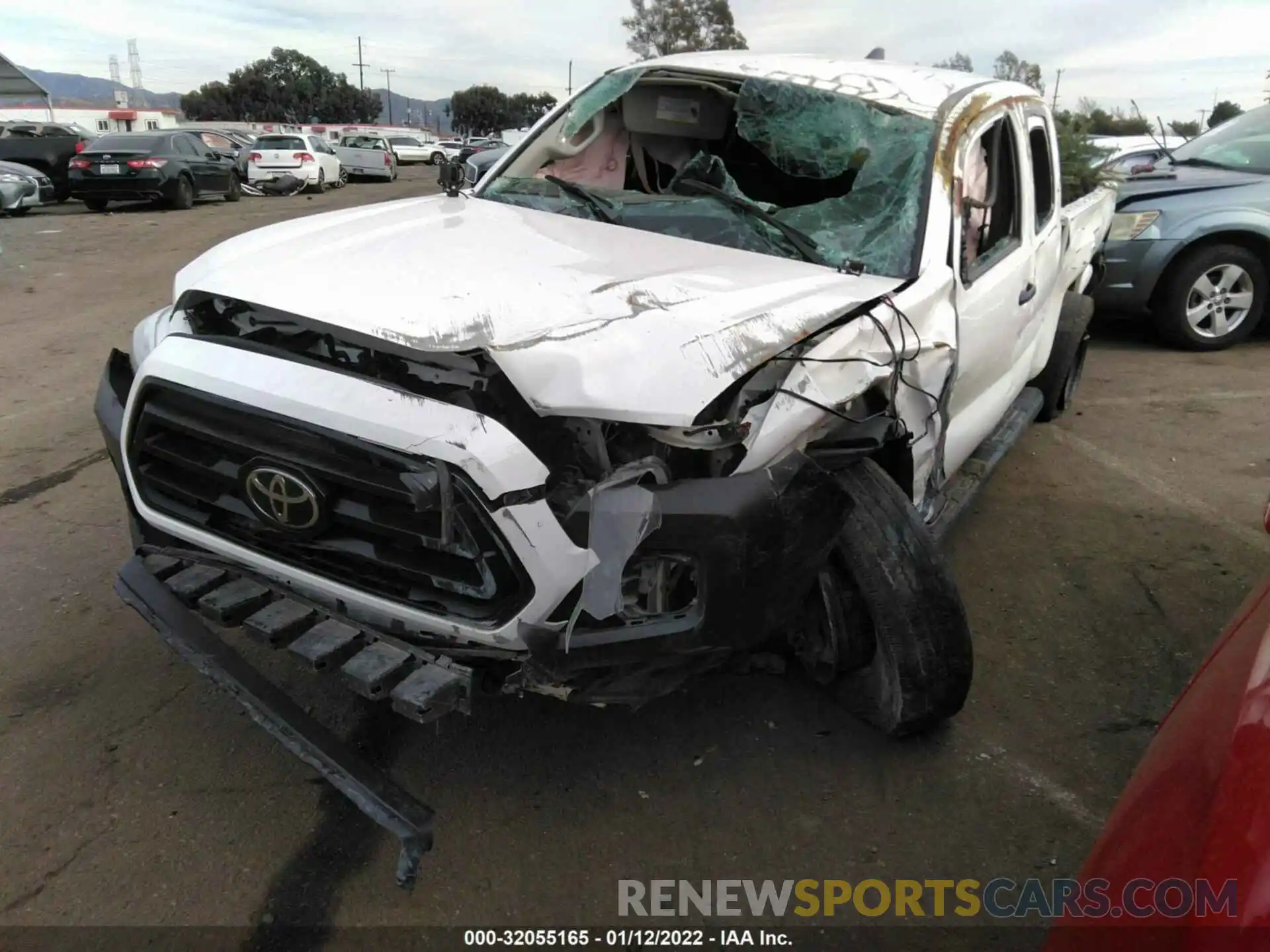 2 Photograph of a damaged car 3TYRX5GN0MT006308 TOYOTA TACOMA 2WD 2021