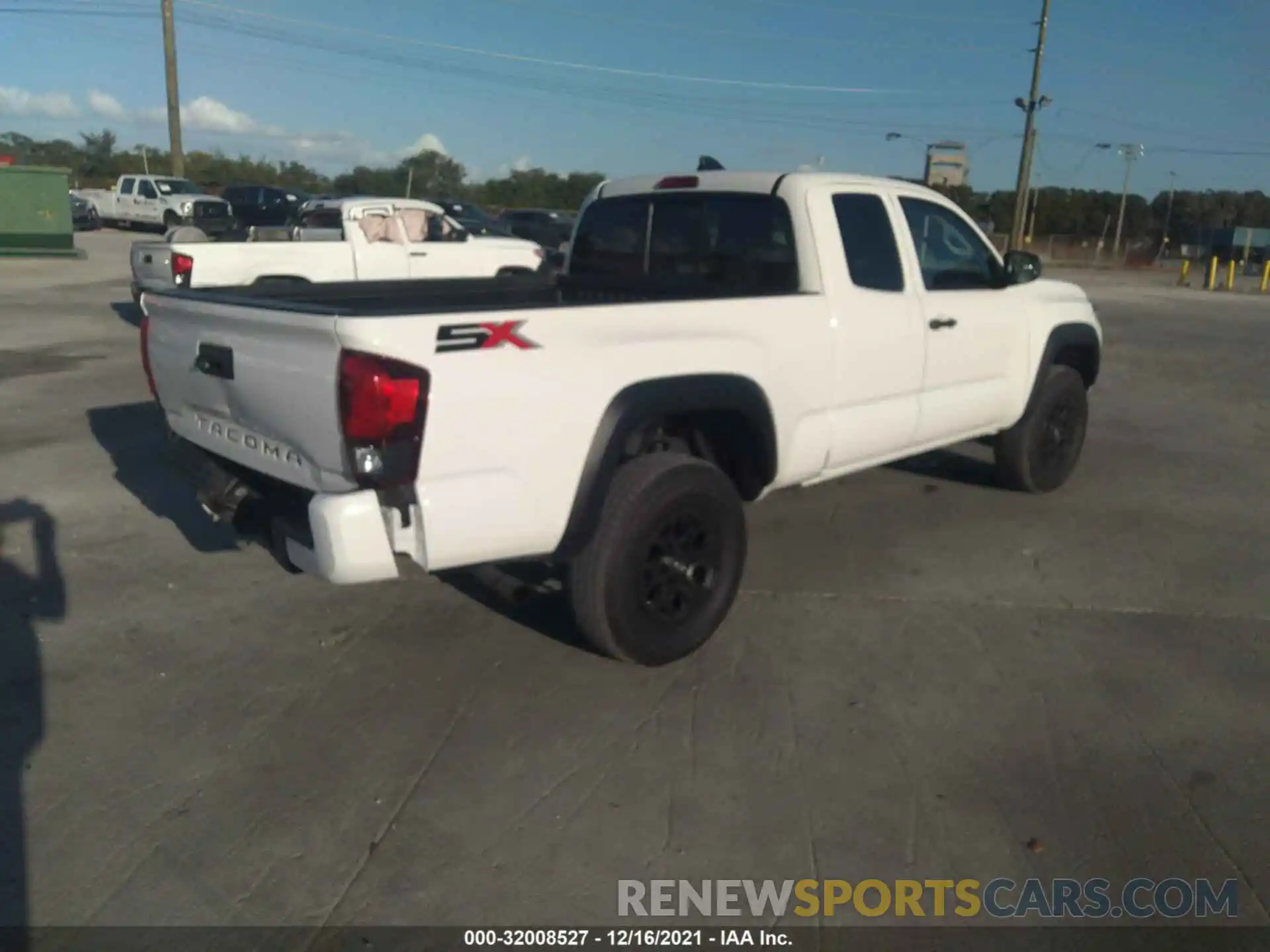 4 Photograph of a damaged car 3TYRX5GN1MT008732 TOYOTA TACOMA 2WD 2021